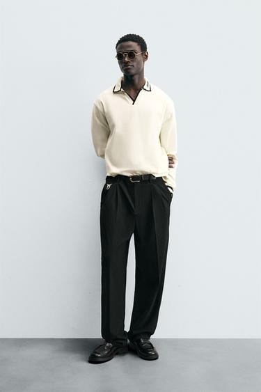 PANTALÓN WIDE FIT PLIEGUES - Negro de Zara - Imagen 0