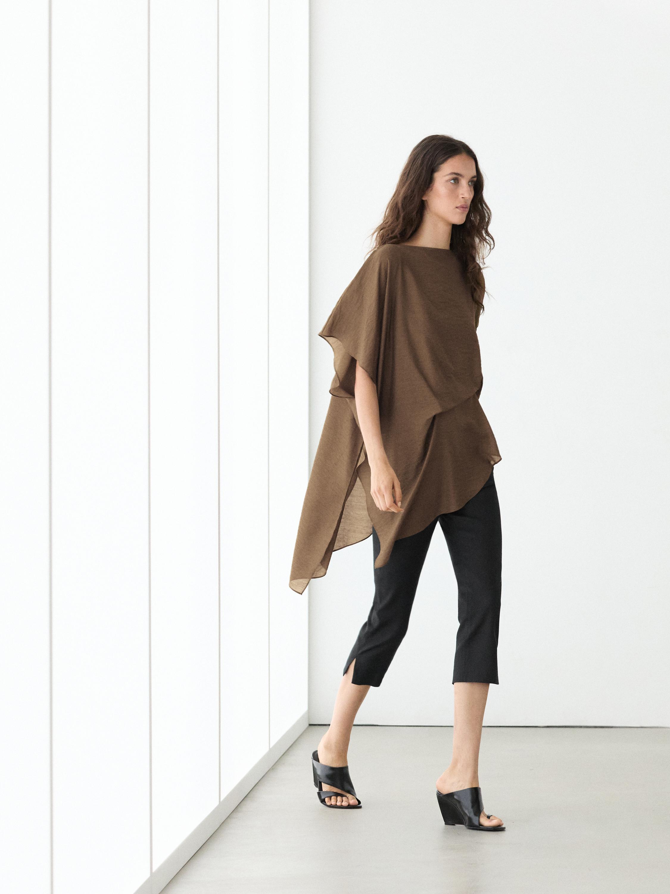 Asymmetric cape-style flowing blouse