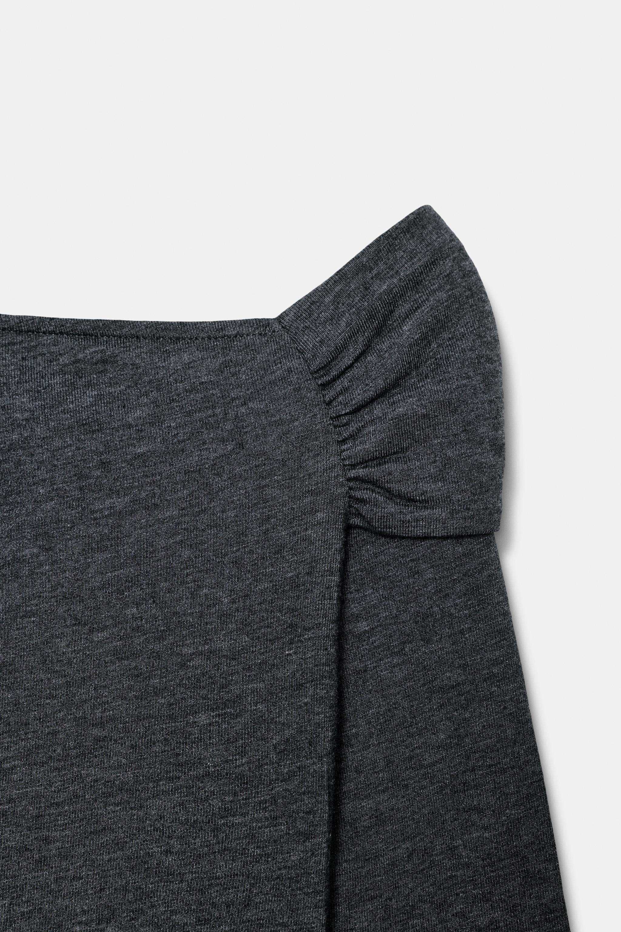 TOP DÉCOLLETÉ ASYMÉTRIQUE