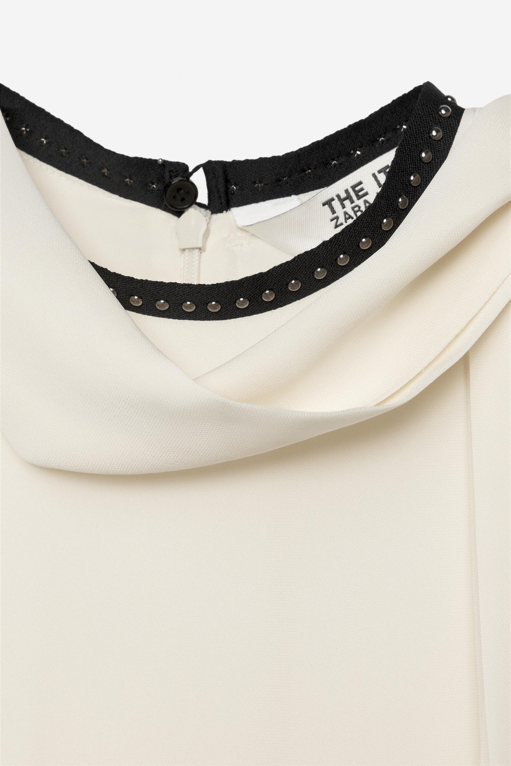 ROBE BRIDES ET CLOUS EN CONTRASTE - THE ITEM