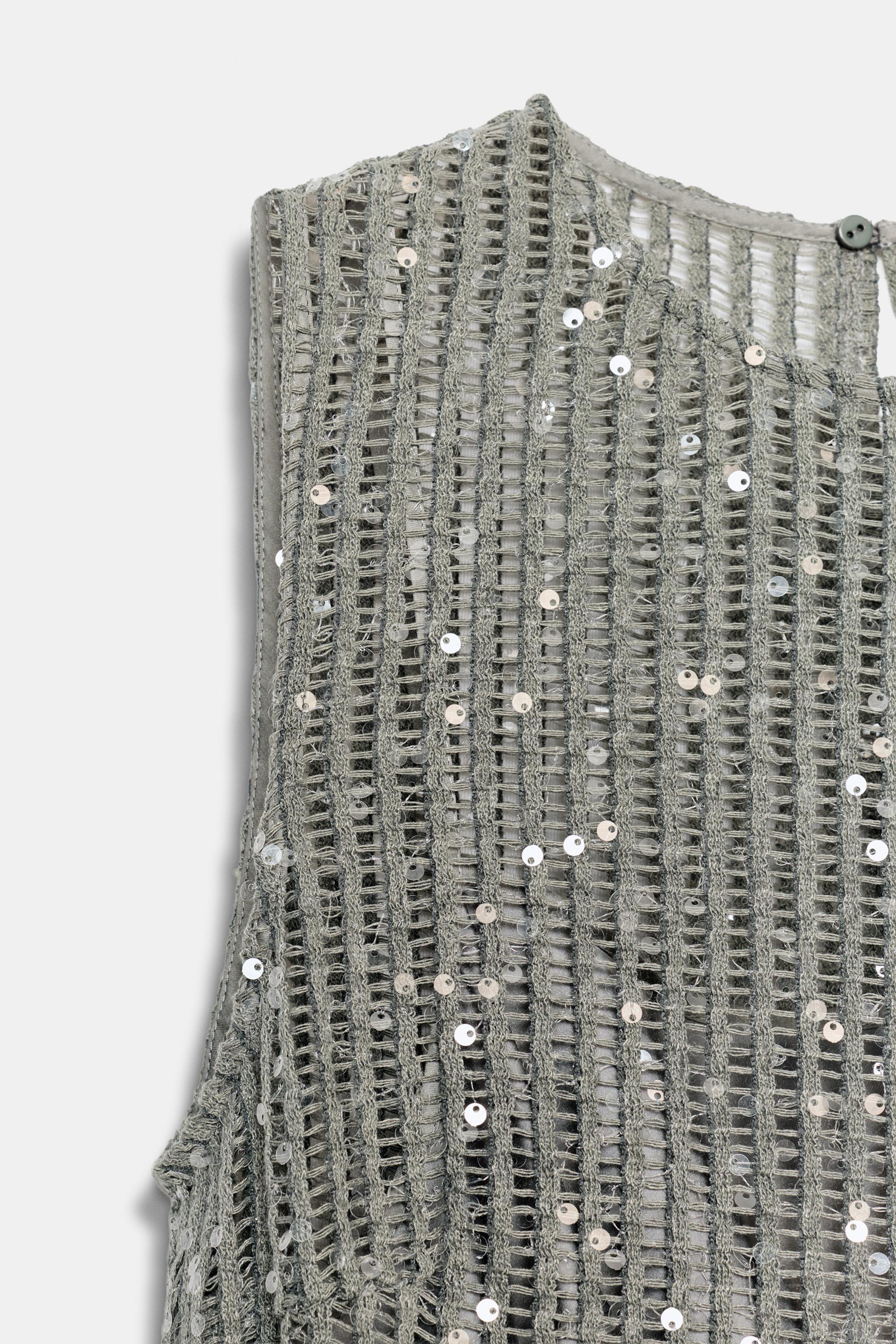 ROBE MI-LONGUE EN RÉSILLE À PAILLETTES