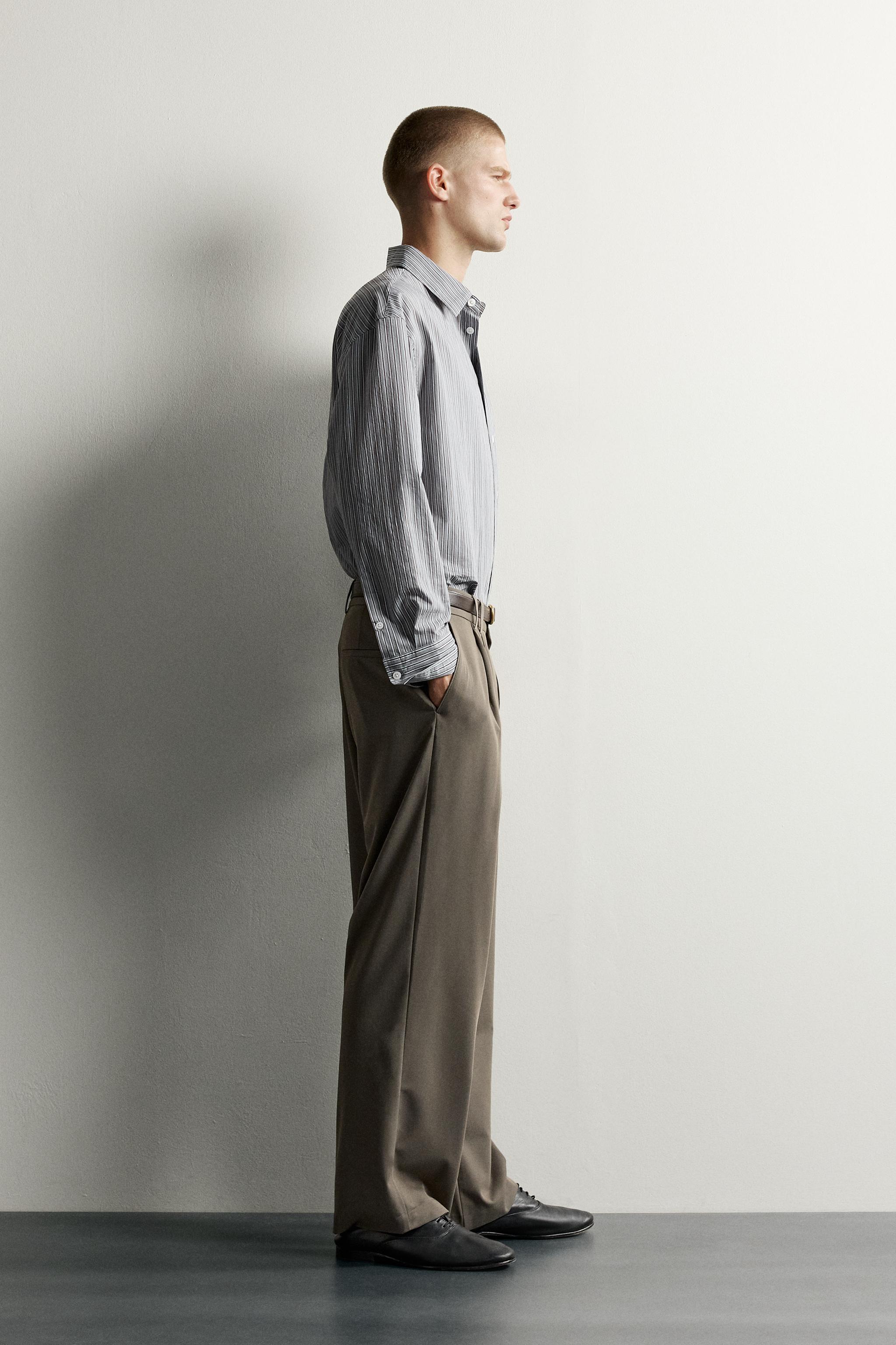 PANTALON WIDE FIT À PLIS