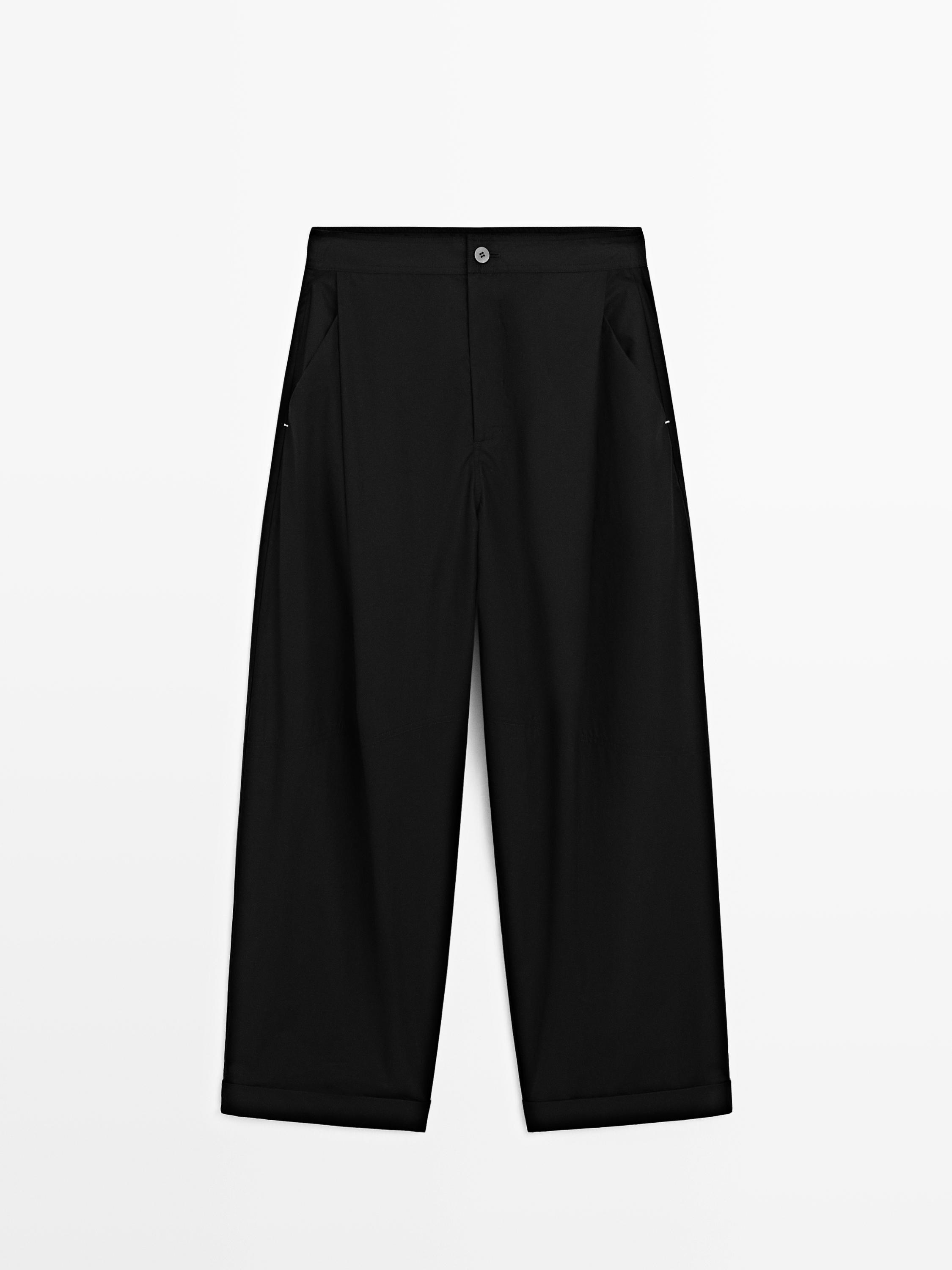 Barrel fit trousers with turn-up detail