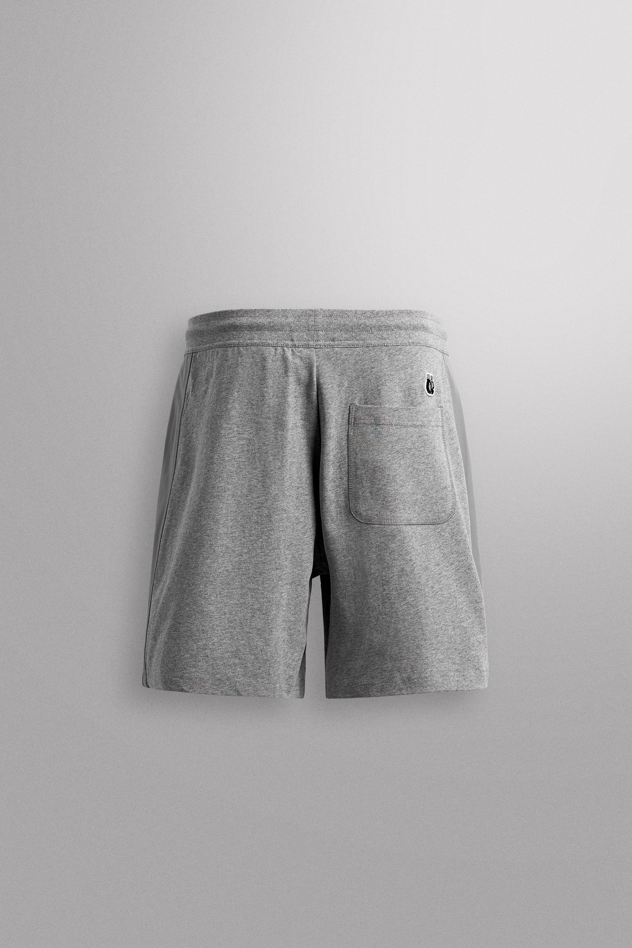 SHORT BRODÉ À BANDES 9"