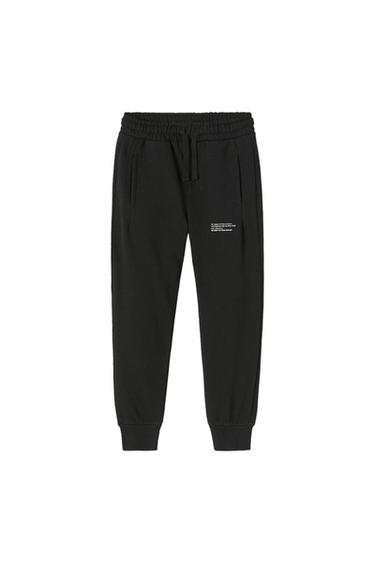 PLUSH TROUSERS WITH LABEL AND SEAM DETAILS
