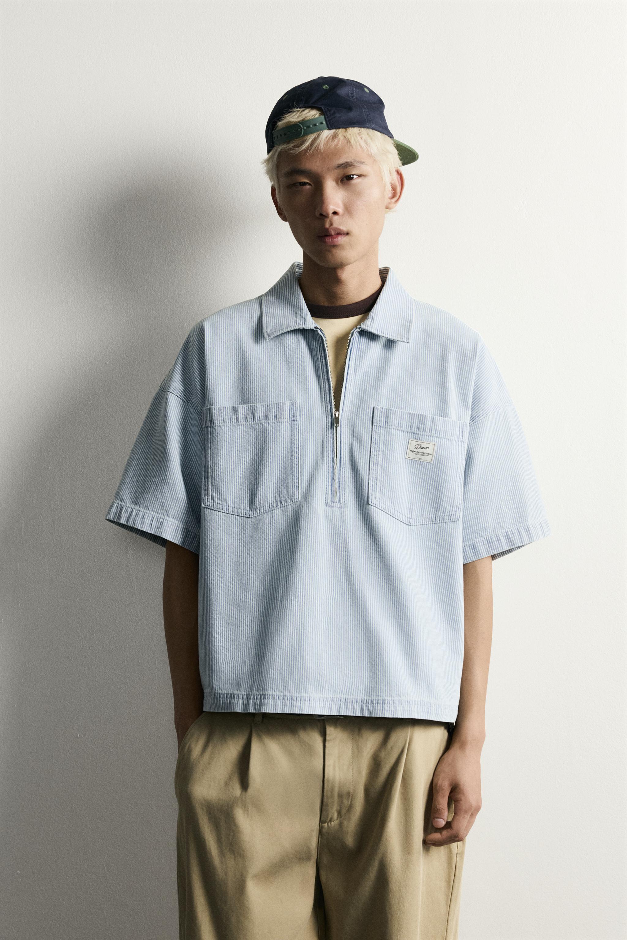 STRIPED ZIP-UP POLO SHIRT — Light blue