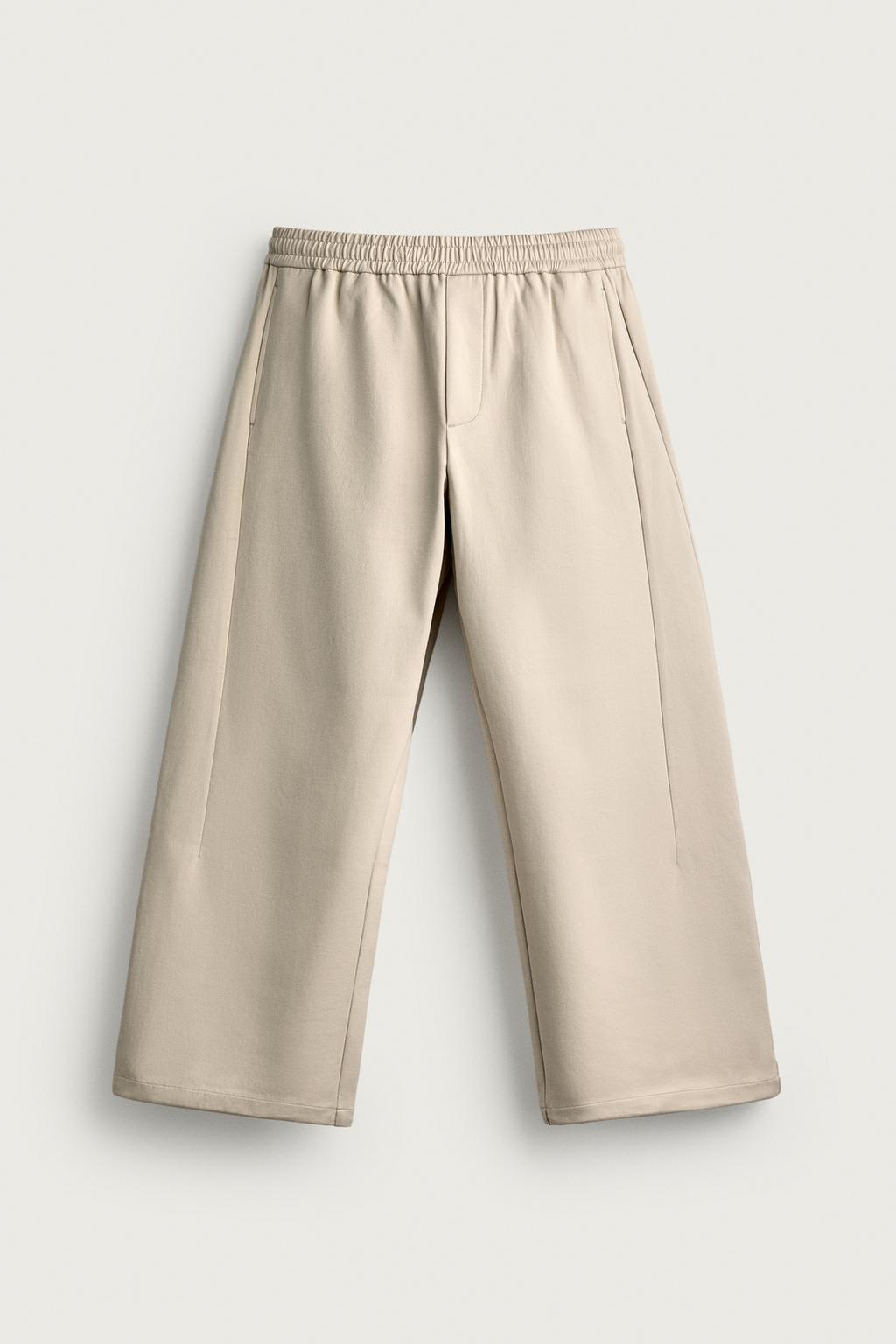 TECHNICAL WIDE-LEG TROUSERS