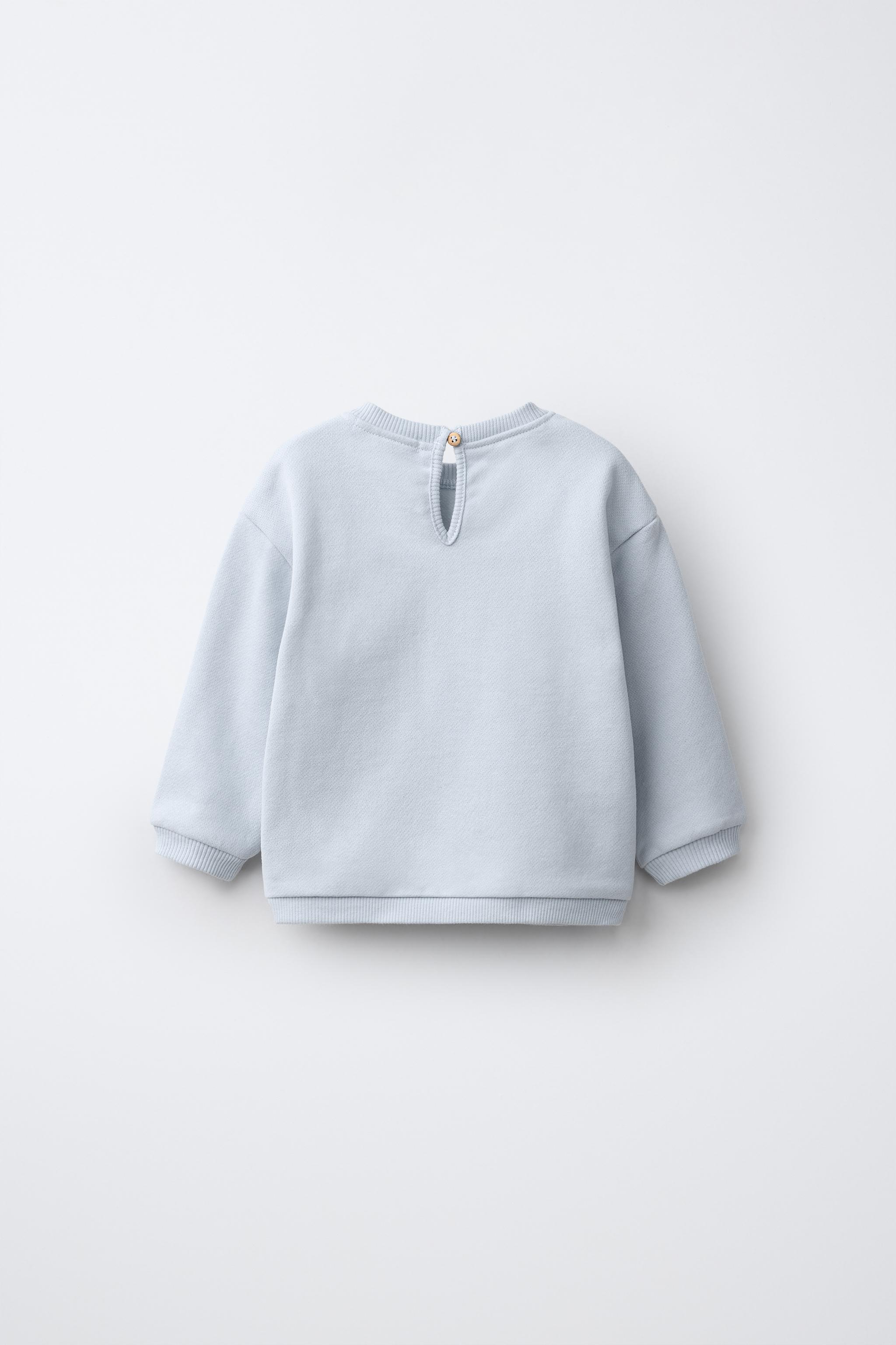 SWEAT À FLEURS AU CROCHET