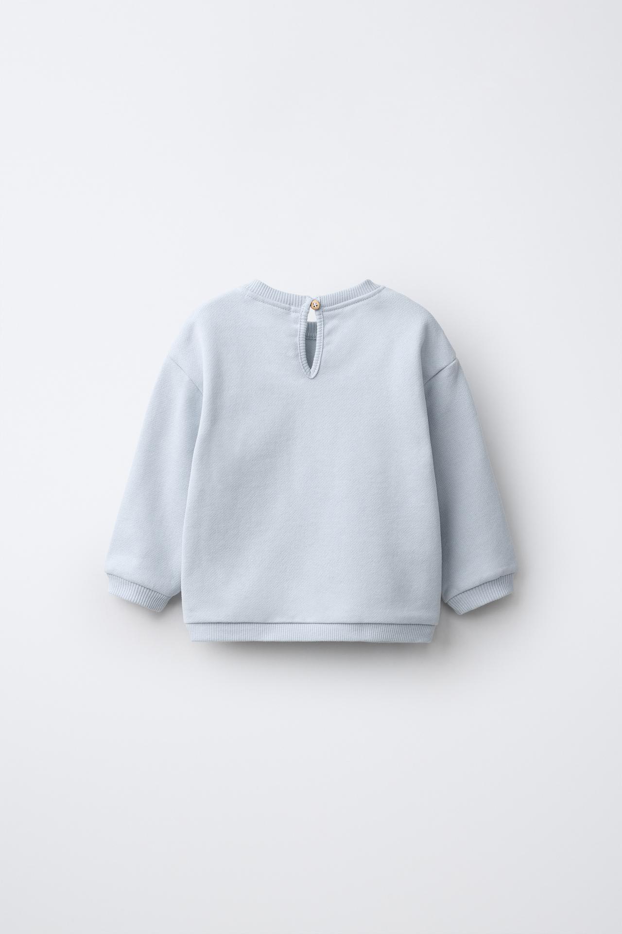 CROCHET FLOWER APPLIQUÉ SWEATSHIRT — Bluish