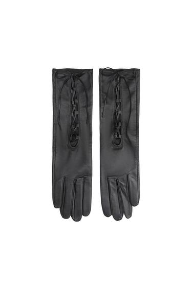Front view of black gloves with lace detail at the top.