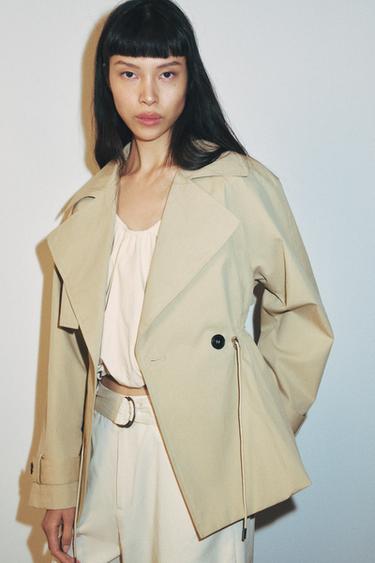SHORT TRENCH COAT WITH ADJUSTABLE WAIST - Ecru / Beige by Zara