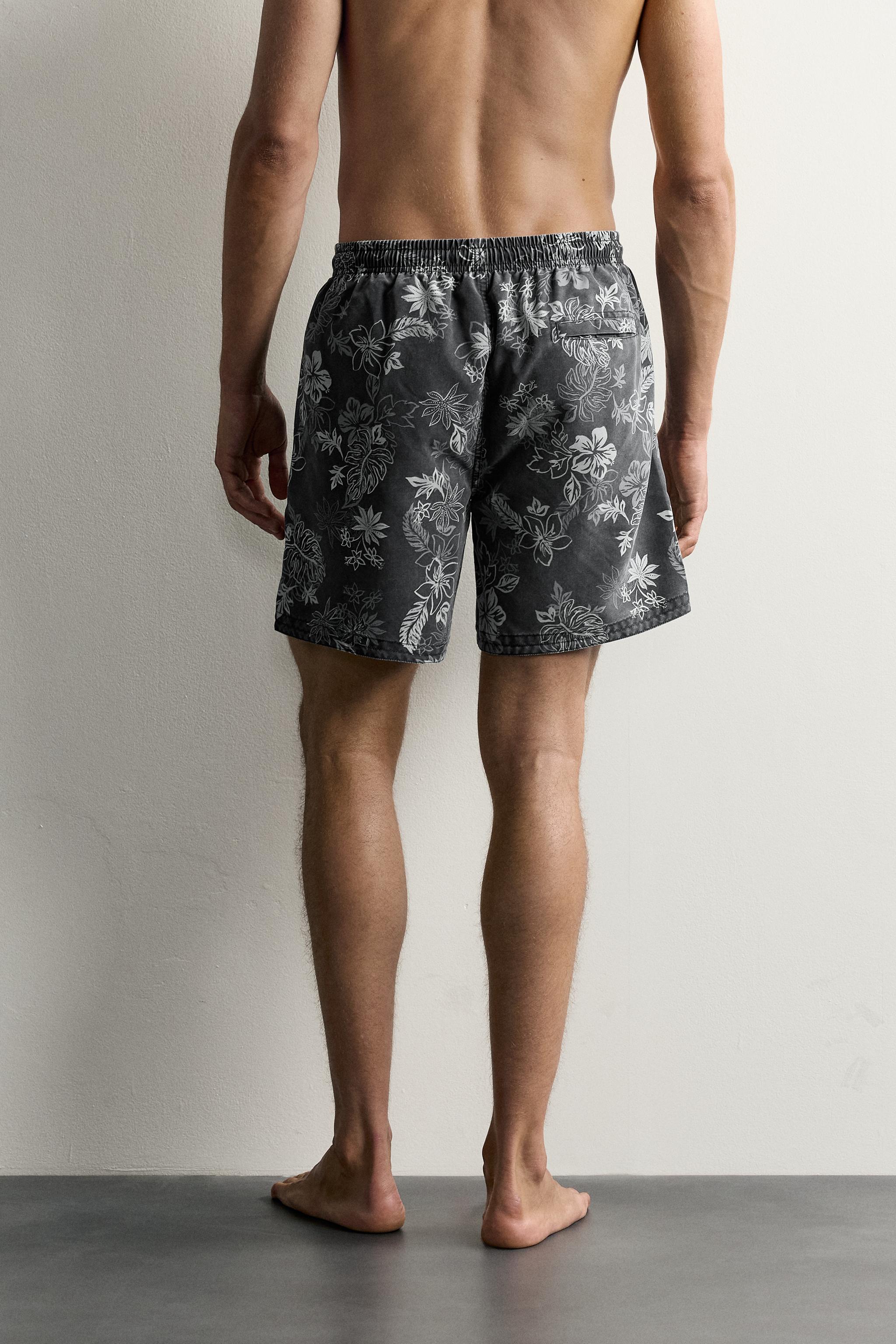 FLORAL PRINT LONGLINE SWIM SHORTS