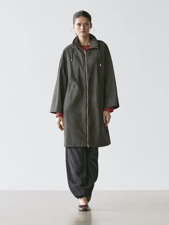 Technical fabric trench coat with hood