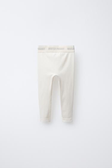LEGGING CÔTELÉ AVEC INSCRIPTION EN RELIEF - Écru de Zara - Image 1