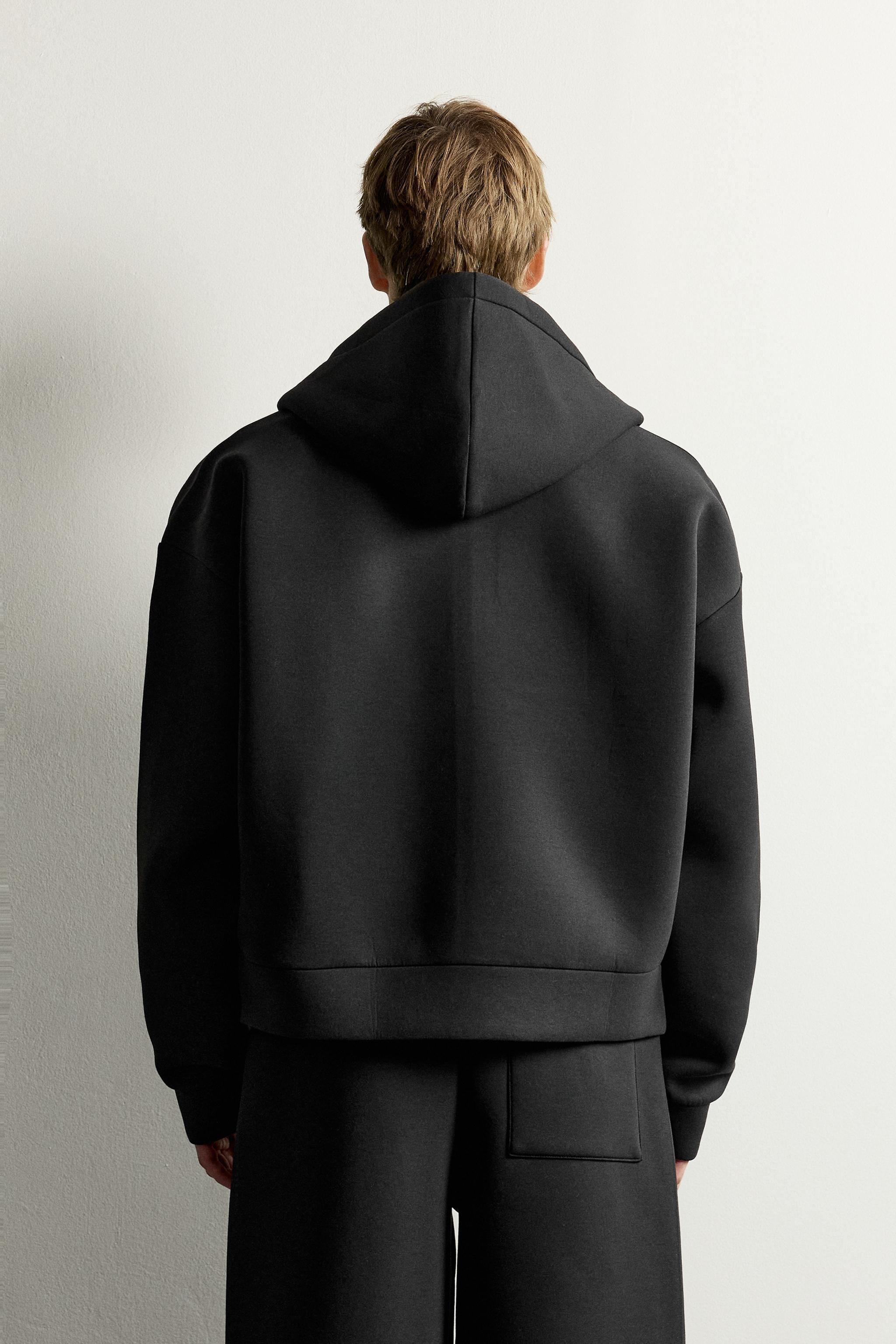 TECHNICAL ZIP-UP HOODIE