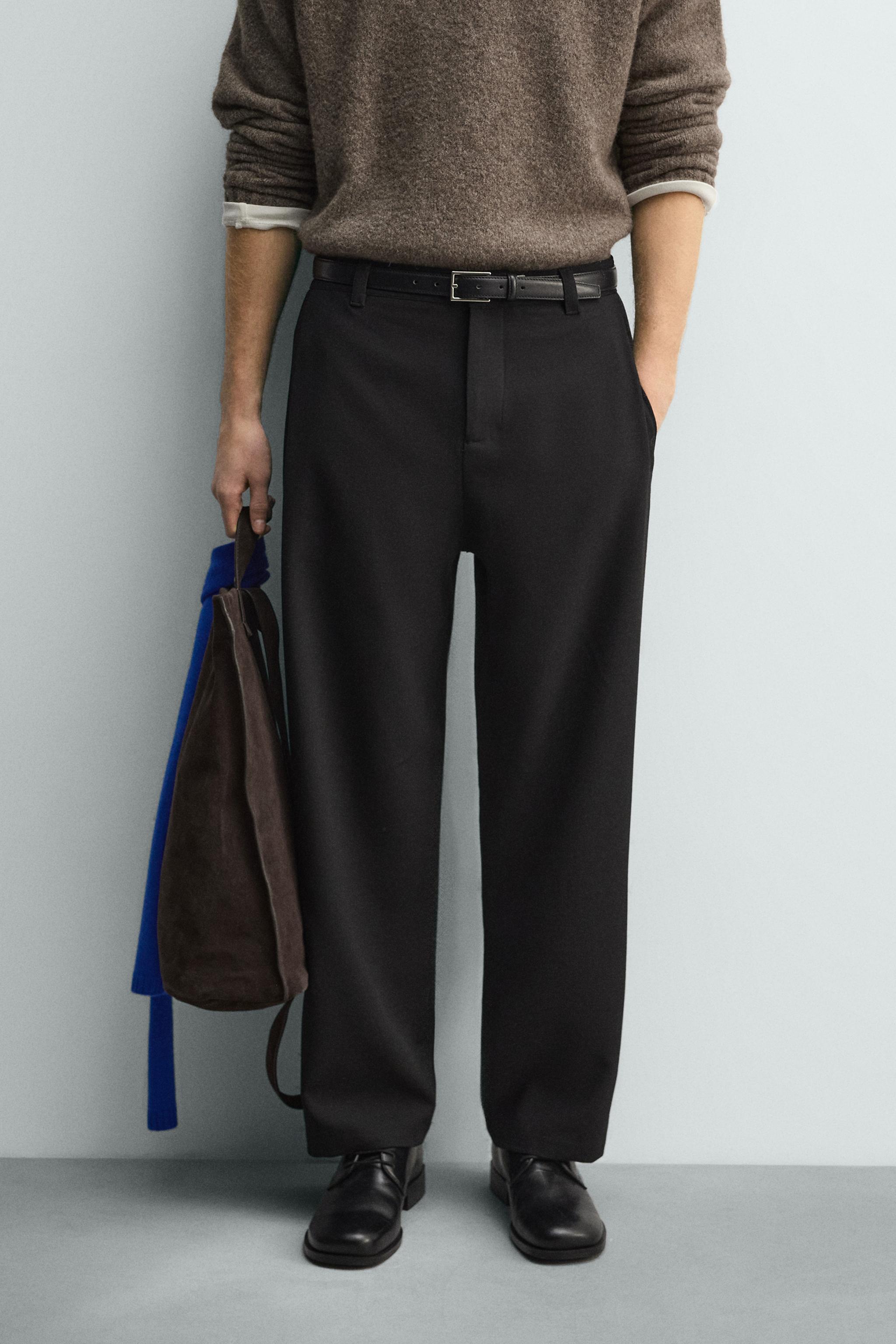 RELAXED FIT PLEATED PANTS