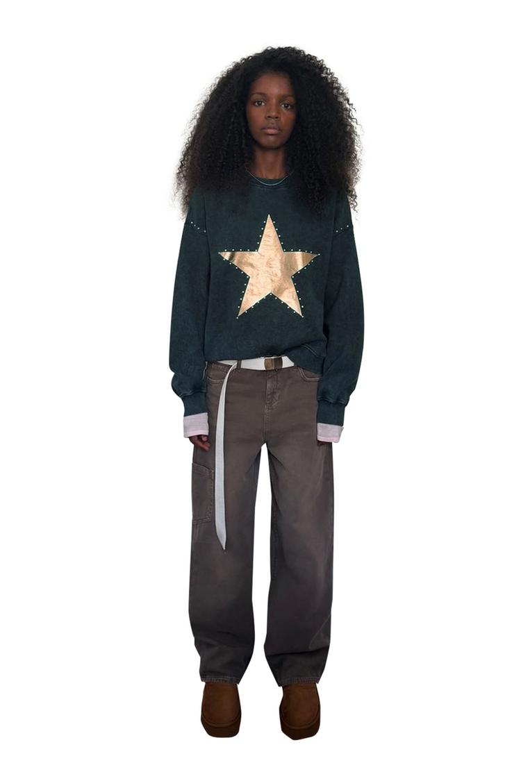 Sudadera tachas estampado estrella