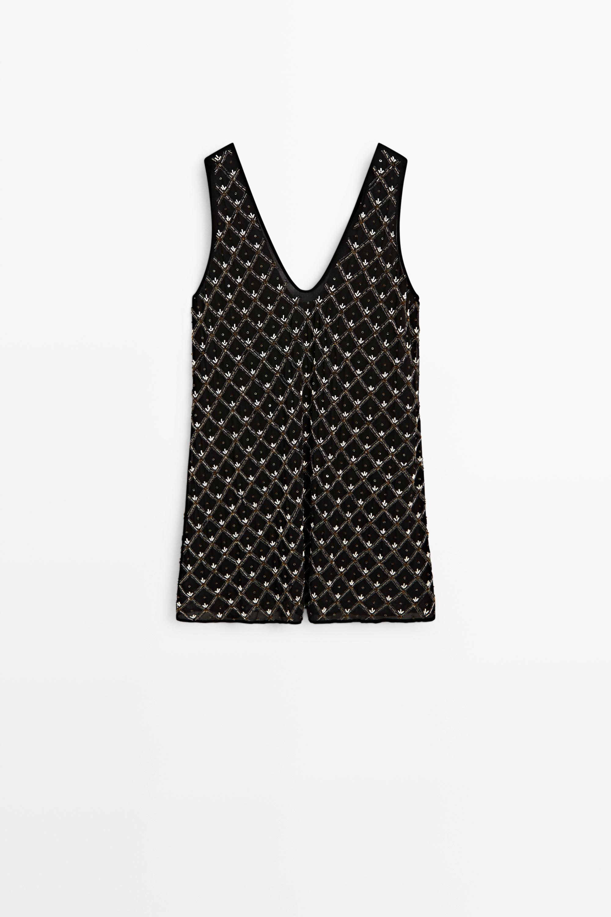Mini dress with beaded detail