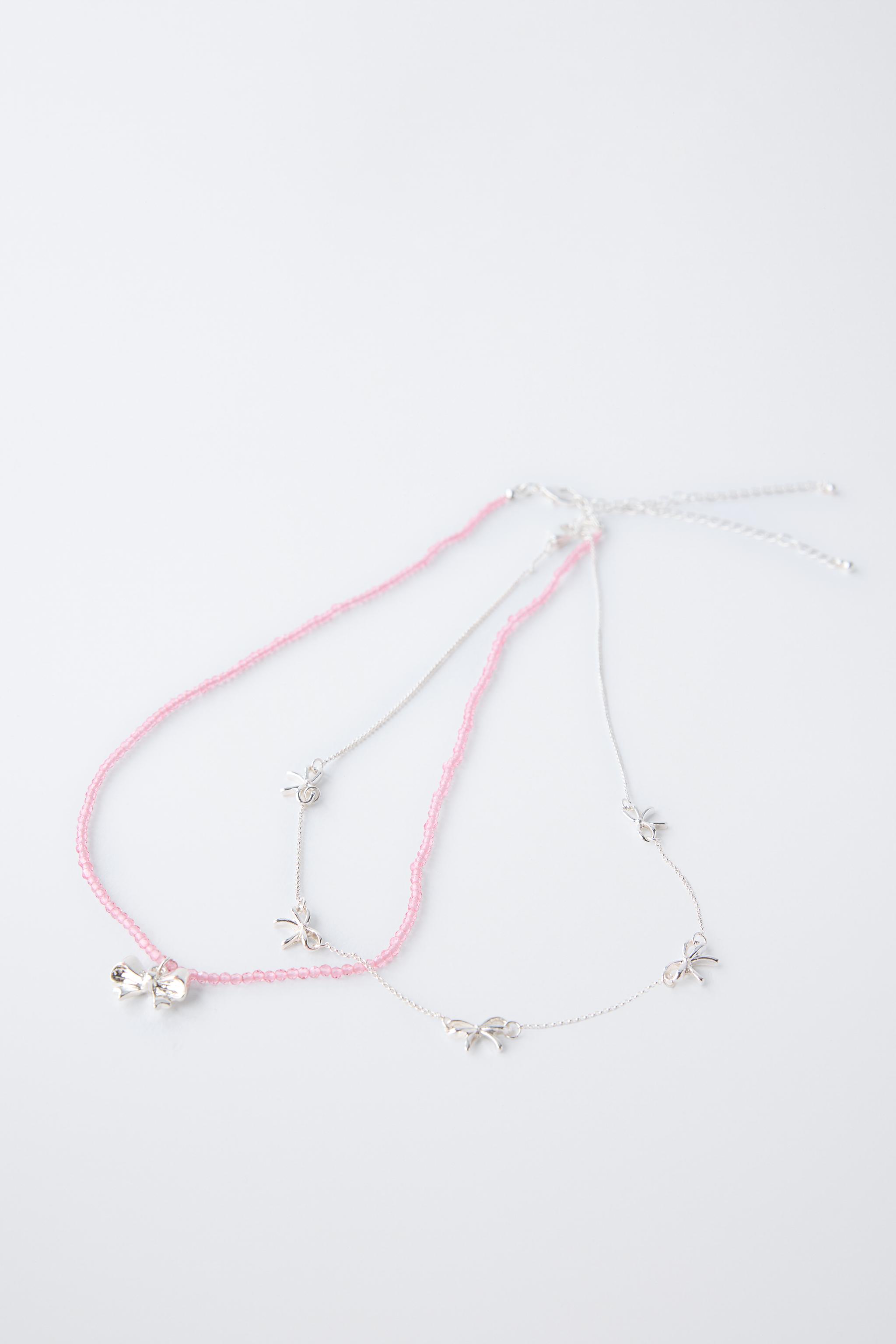 LOT DE DEUX COLLIERS À NŒUDS