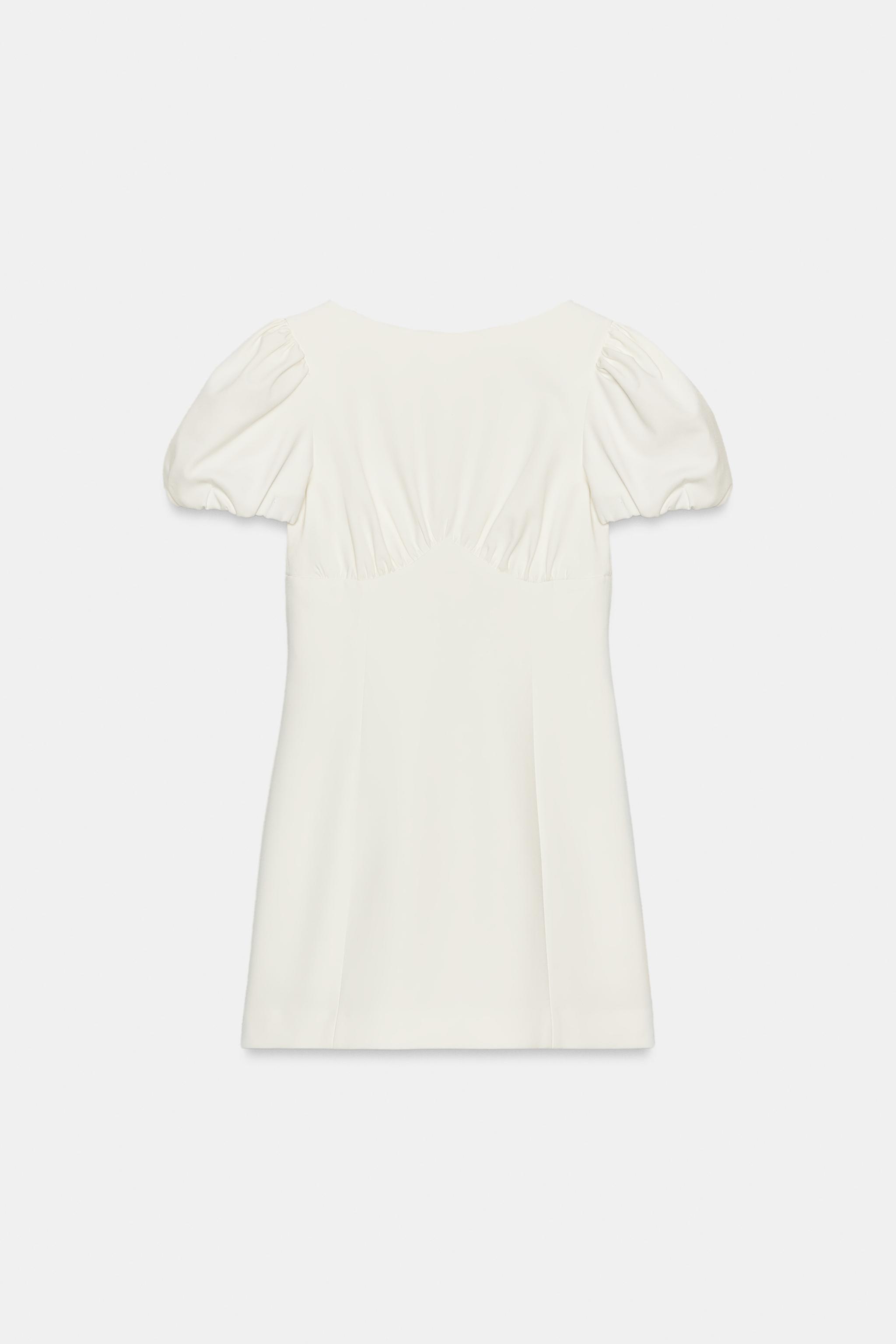 ROBE COURTE PLIS POCHES