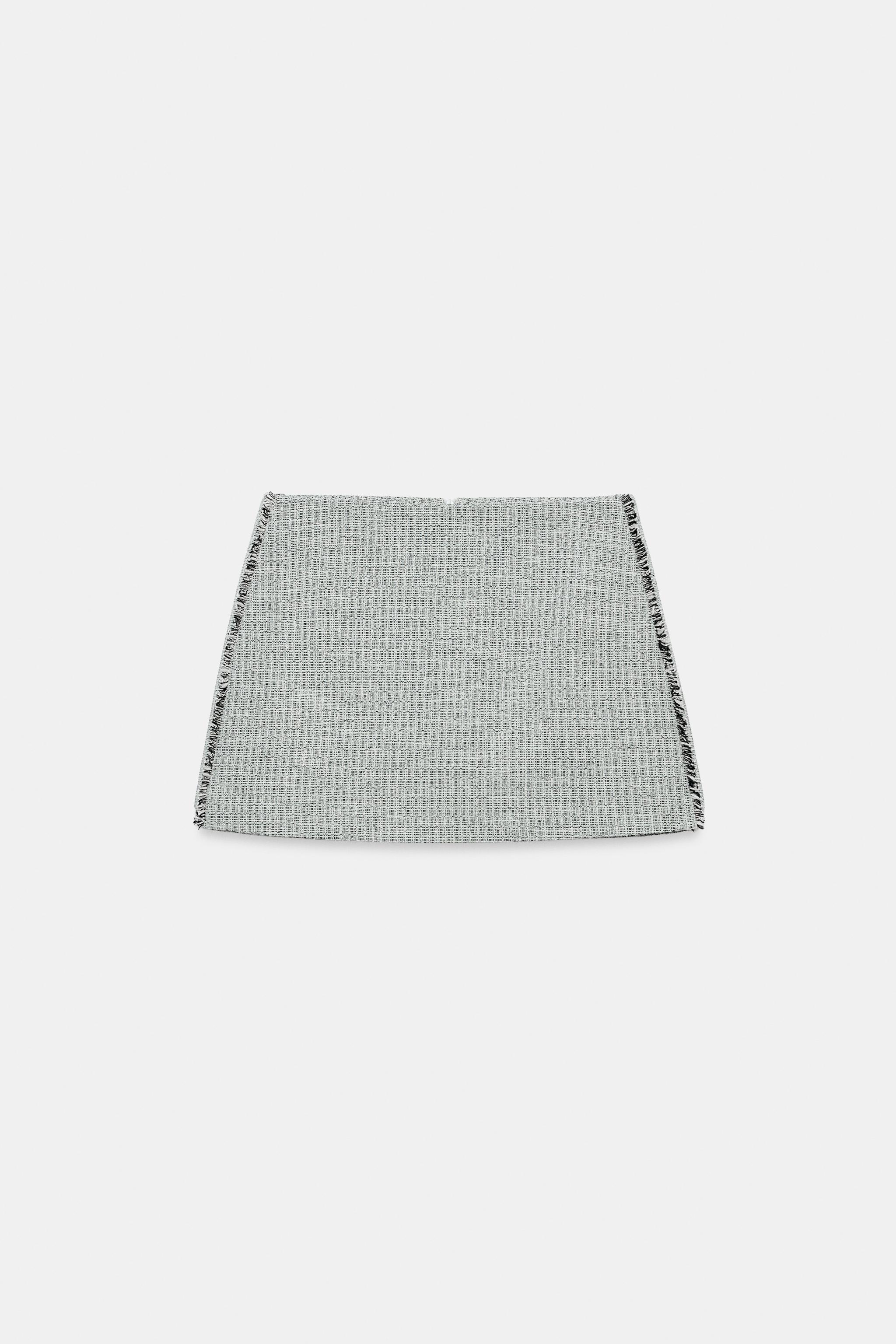 TEXTURED FRAYED MINI SKIRT