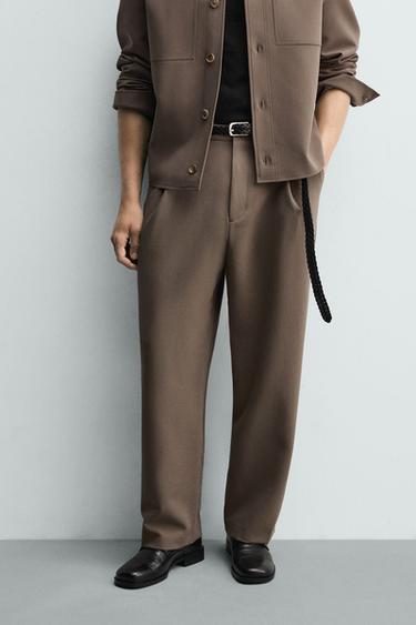 بنطلون فيت مريح بثنيات - بني/ توبو الخاص بـ Zara
