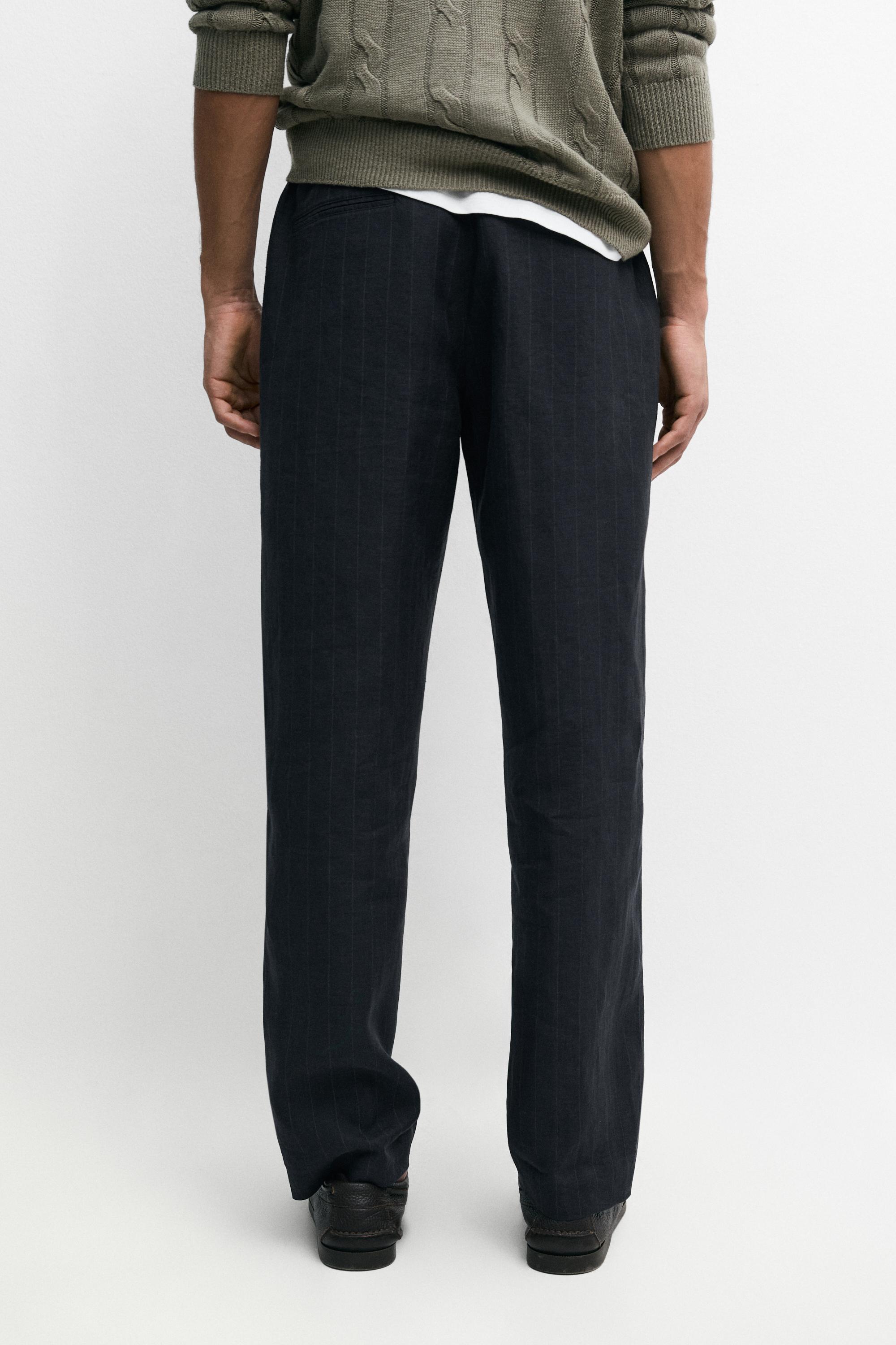 Linen trousers with striped detail