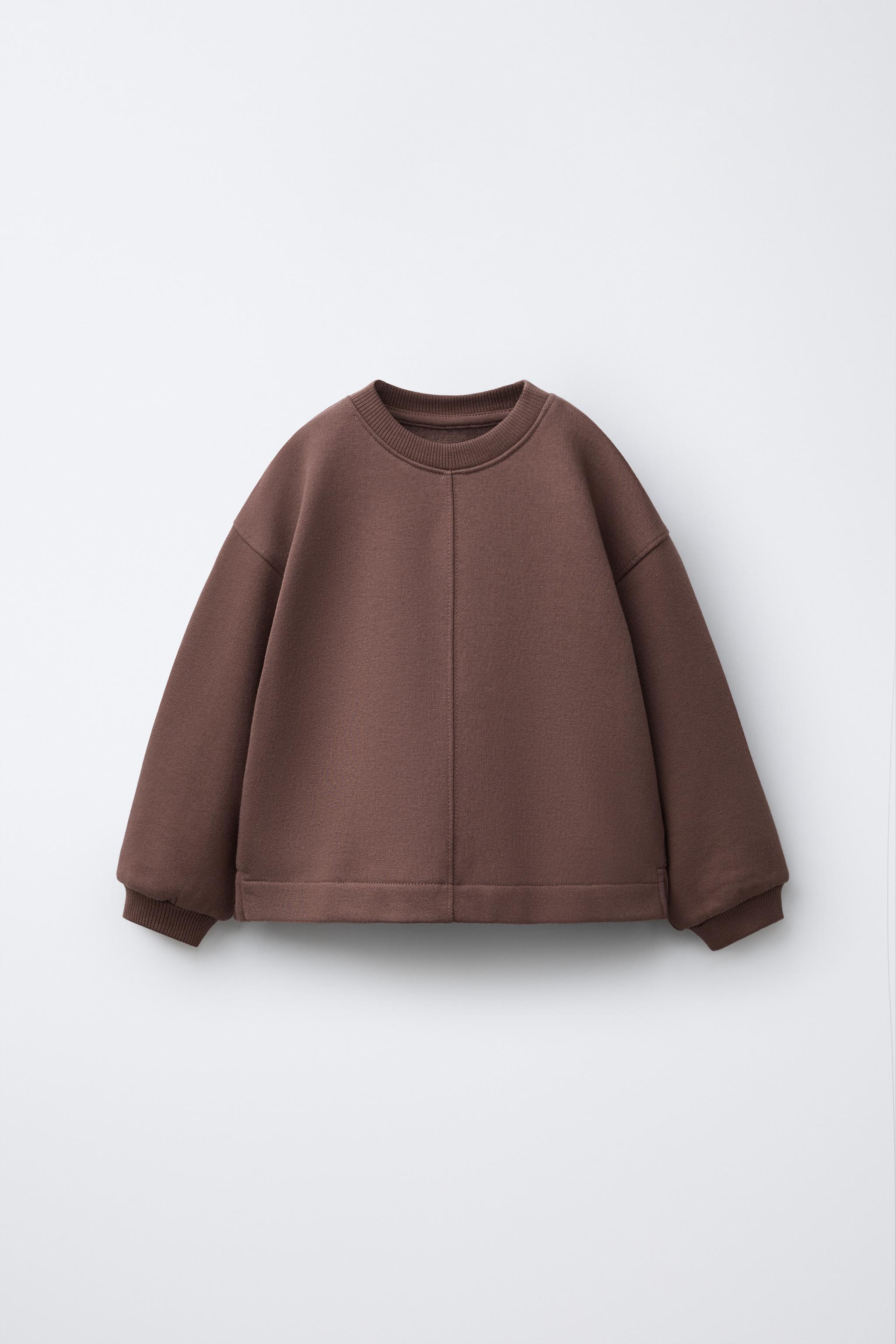SWEAT AVEC INSCRIPTION EN RELIEF