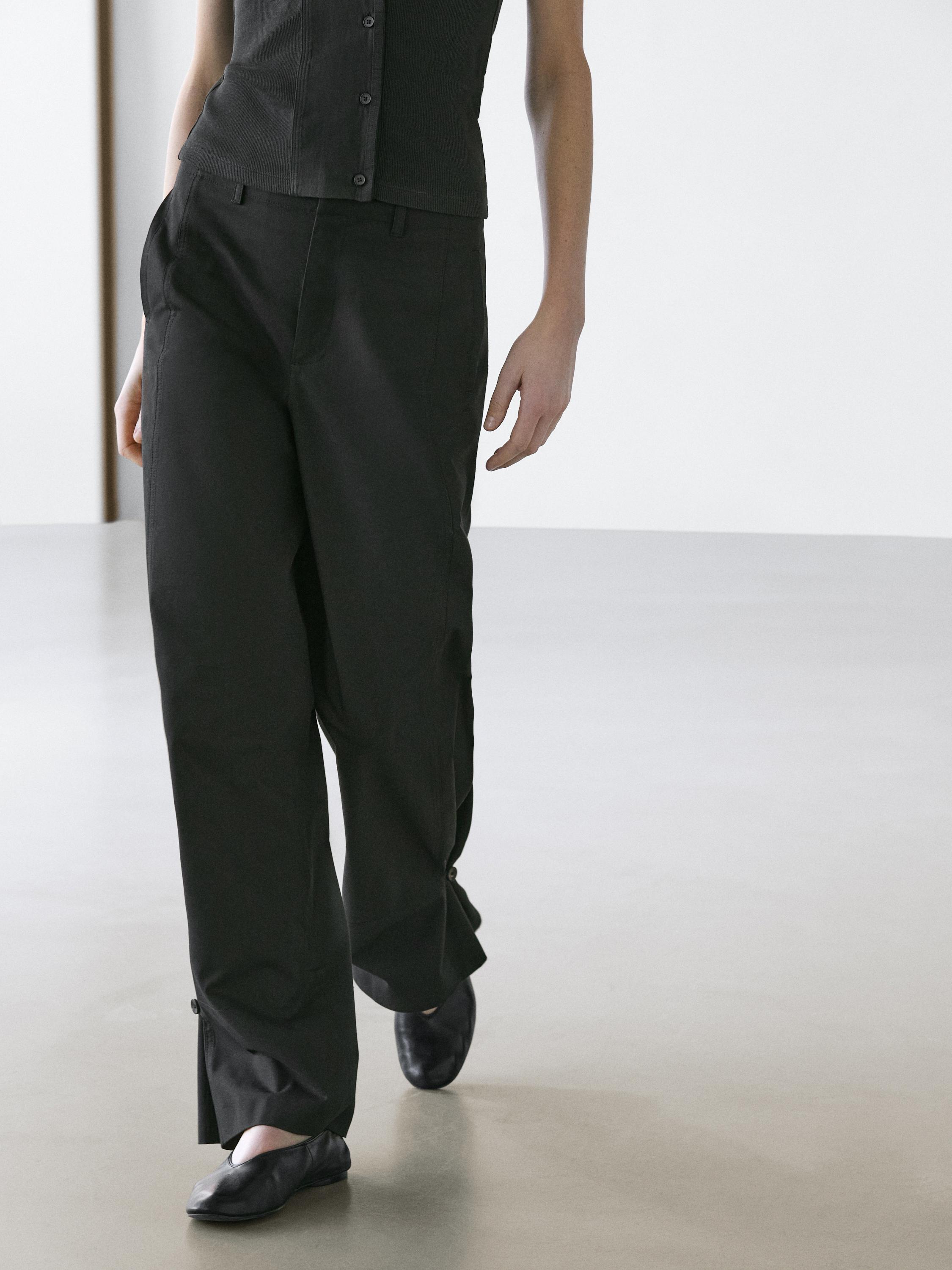 Cotton blend trousers with hem detail