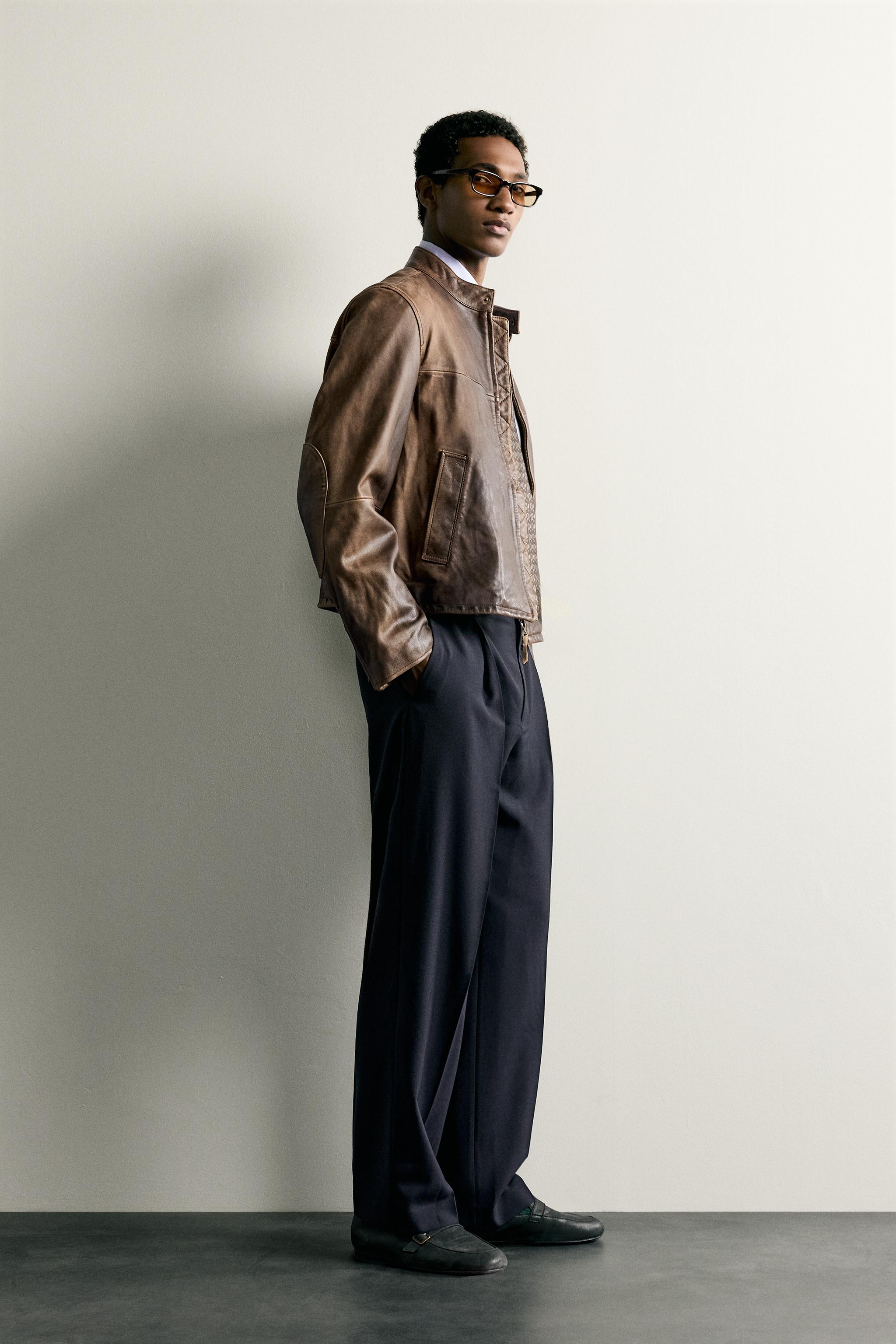 RELAXED FIT PLEATED PANTS