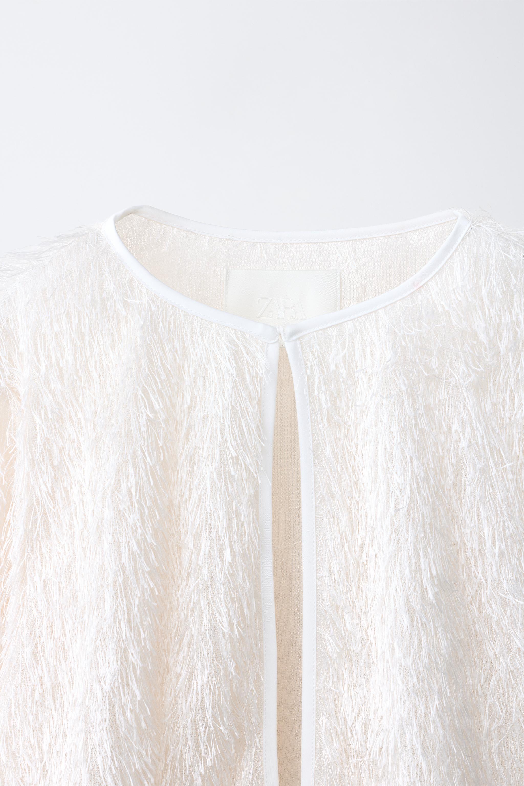 FRINGED JACKET