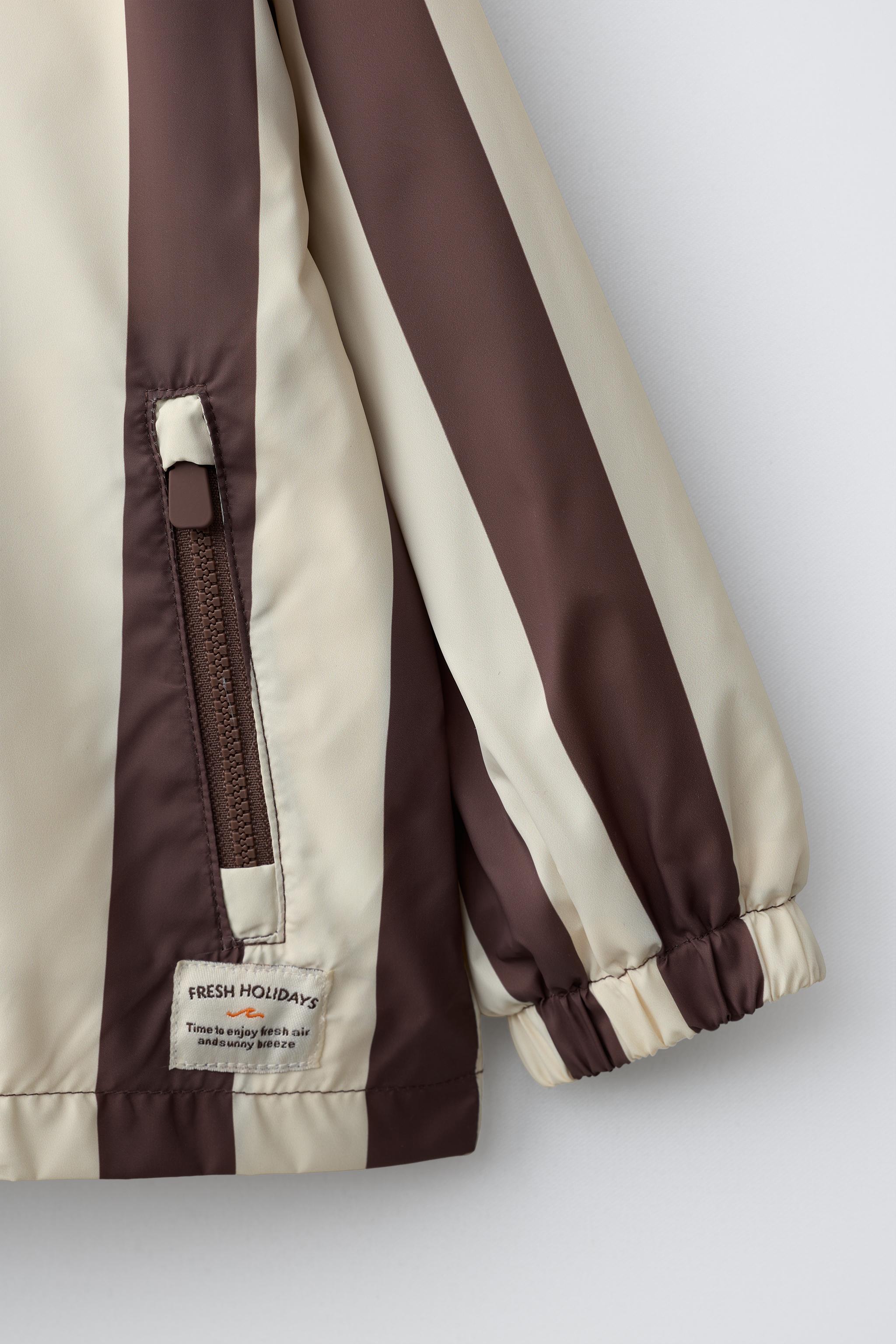 LIGHTWEIGHT STRIPED RAINCOAT