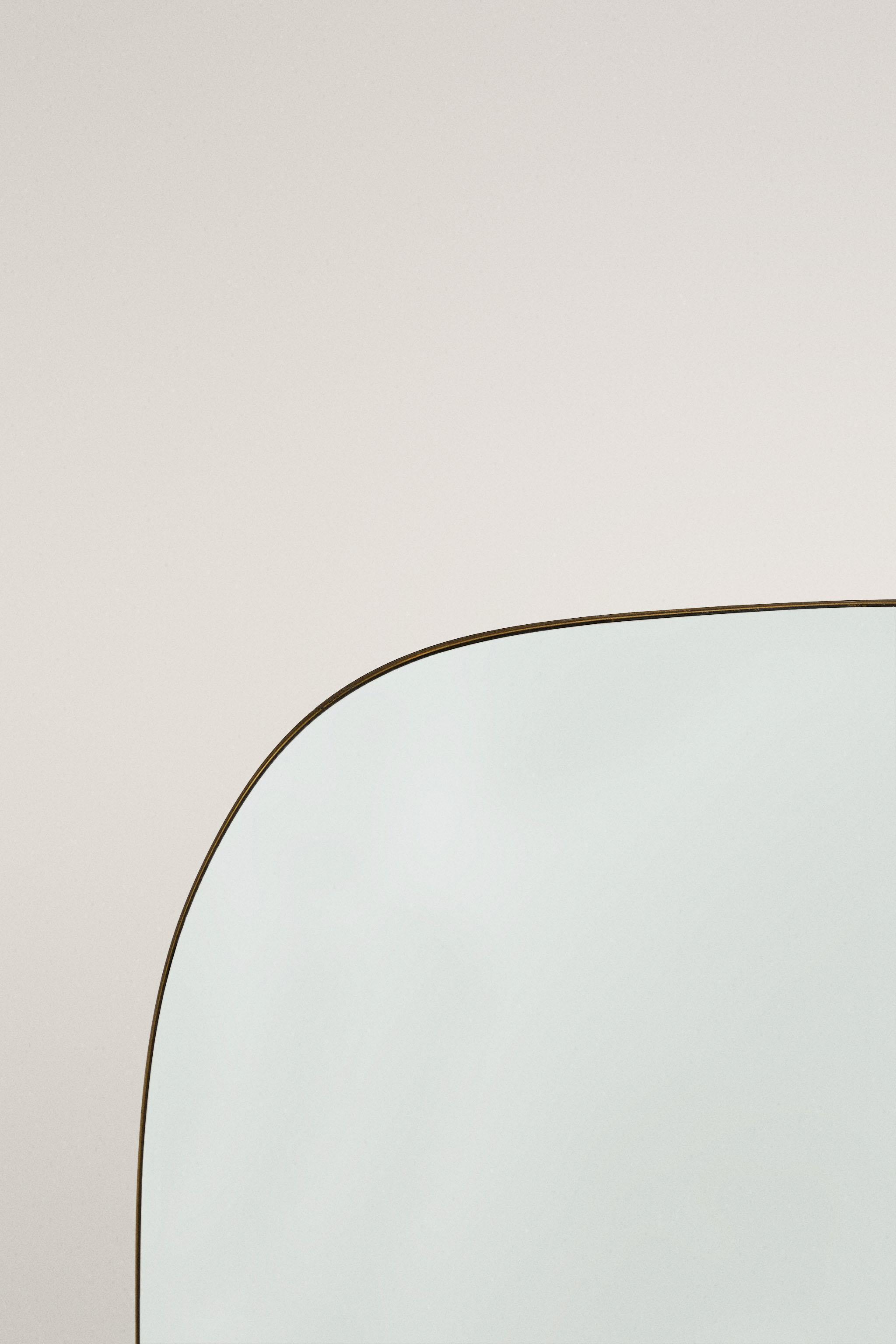 MIROIR MURAL CADRE ARRONDI