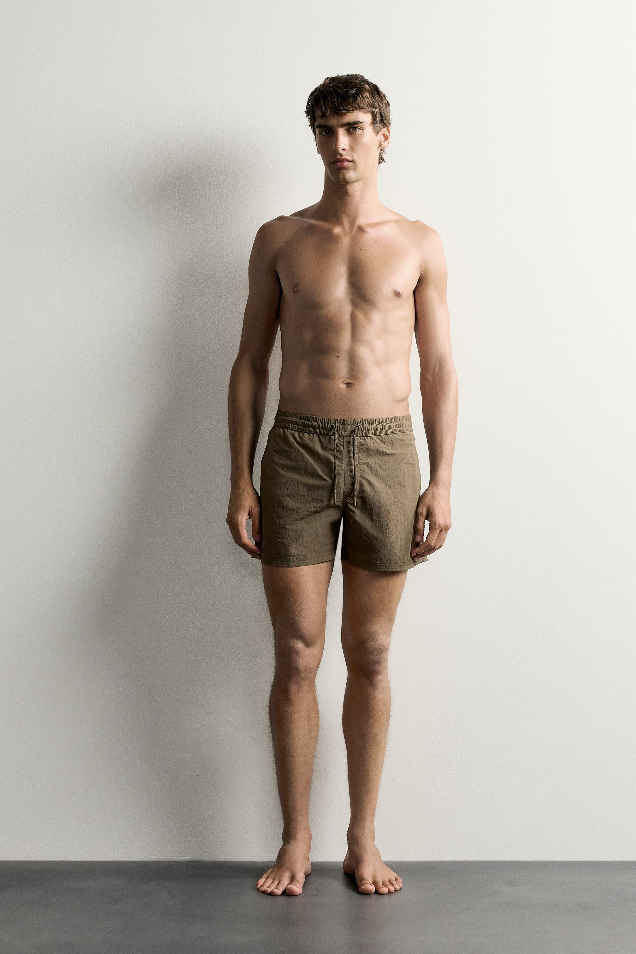 BASIC MID-LENGTH SWIM TRUNKS