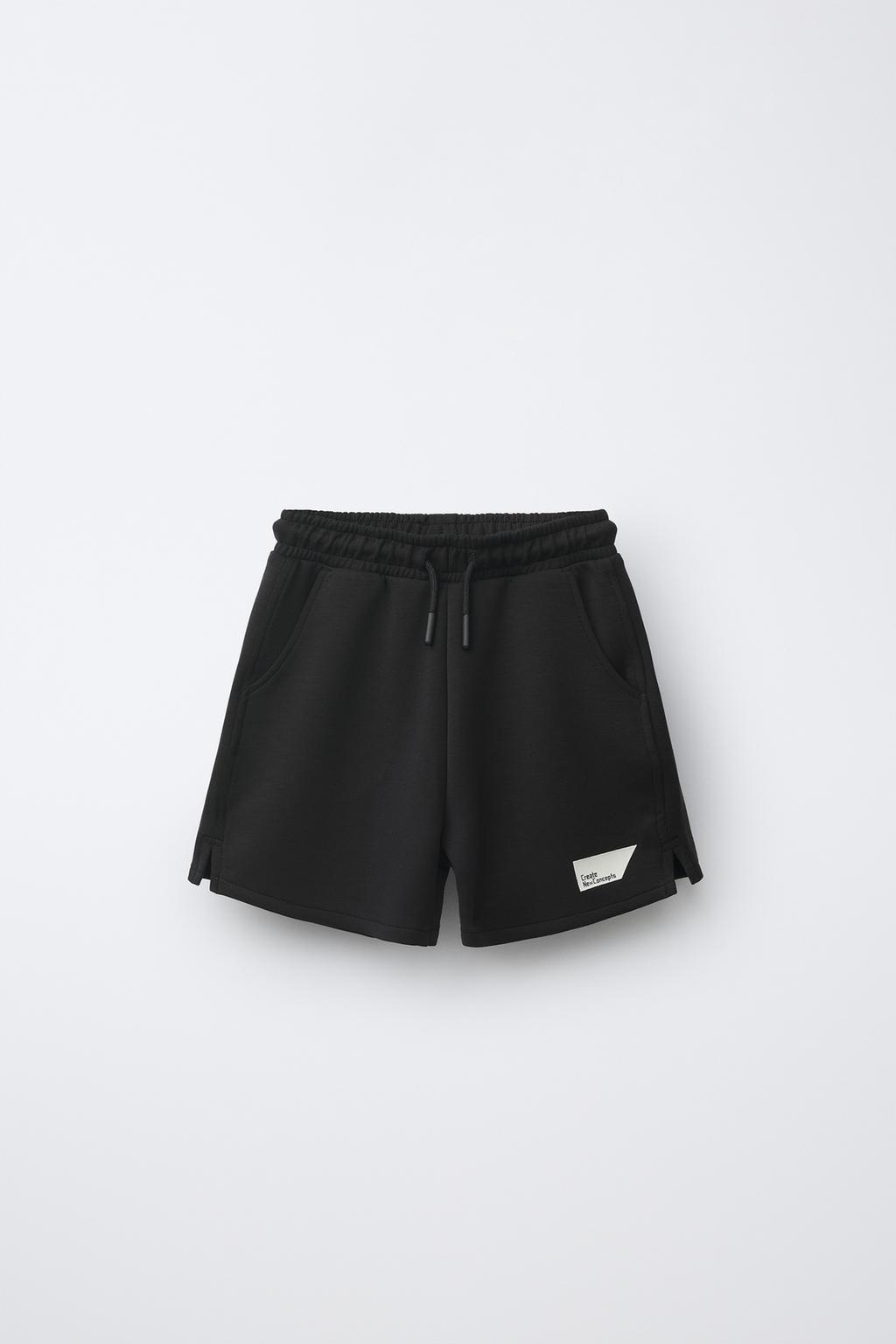 INTERLOCK BERMUDA SHORTS WITH LABEL