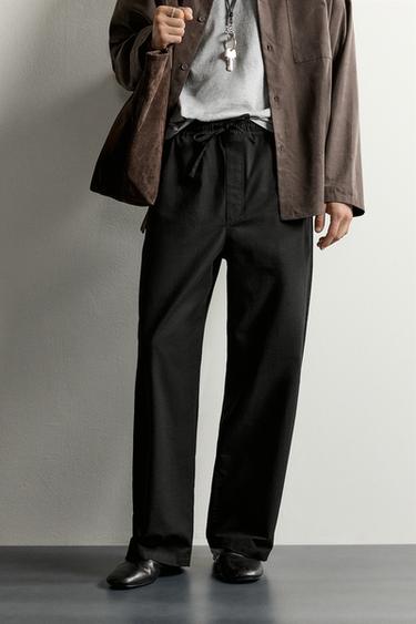 RELAXED FIT BUTTON TROUSERS - Black by Zara