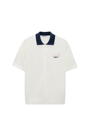 CAMISA PUNTO TEXTO BORDADO
