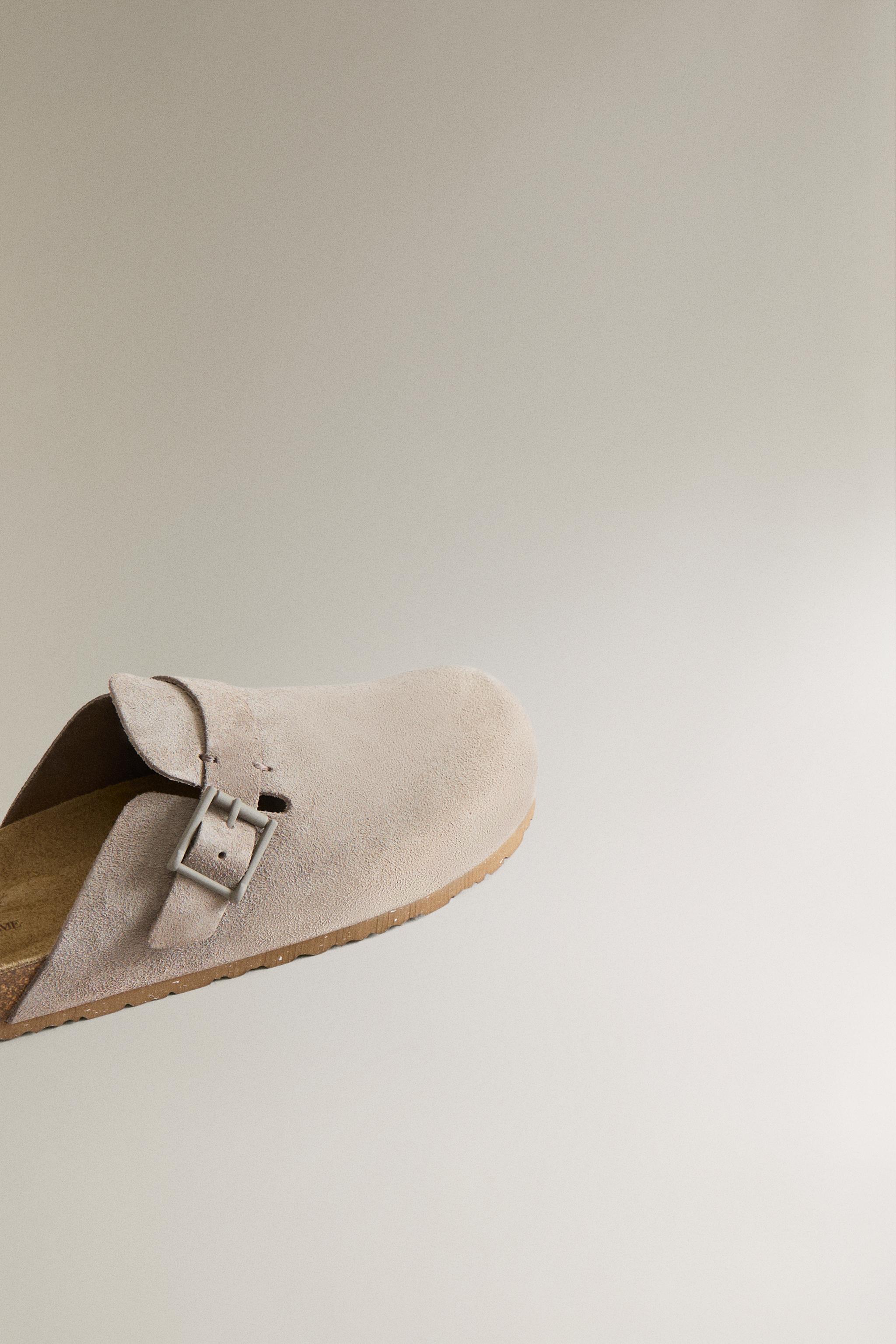 SABOT EN CUIR À BOUCLE ET SURPIQÛRES