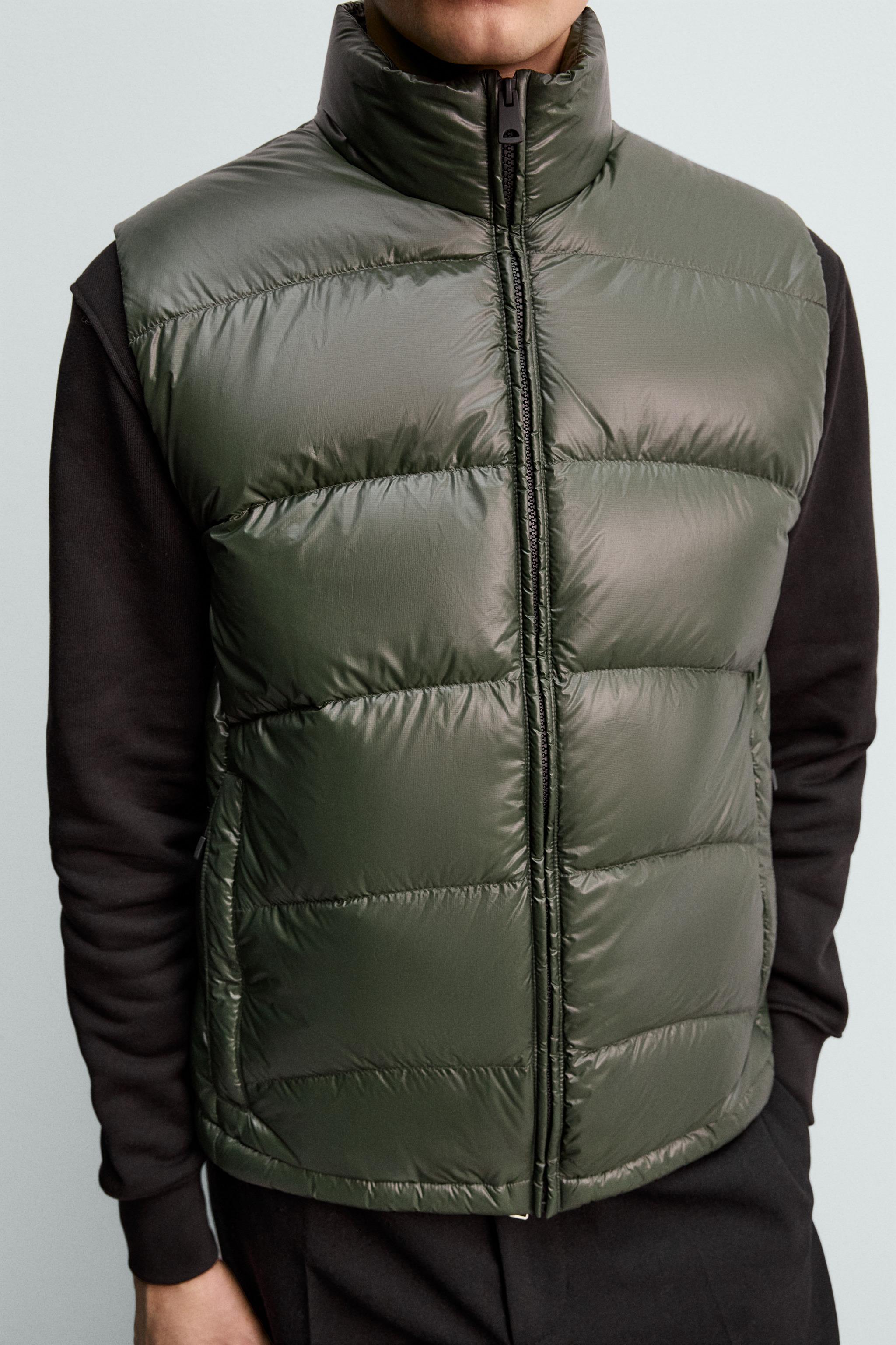 80% DOWN - 20% FEATHER WATER REPELLENT QUILTED VEST ORIGINS