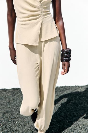HALTER TWO-PIECE EFFECT JUMPSUIT - Sand by Zara - Image 1