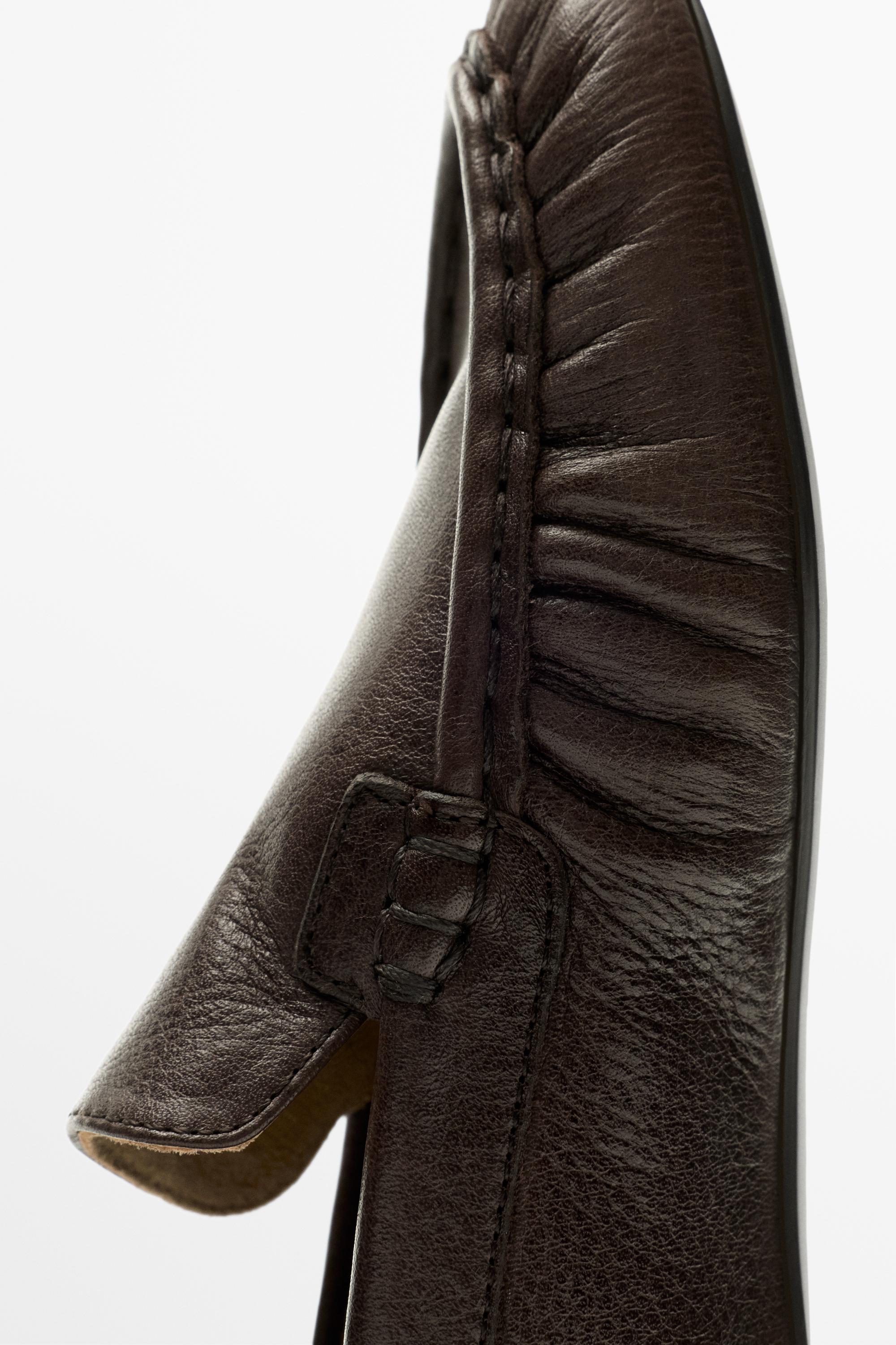 Soft leather moc toe loafer