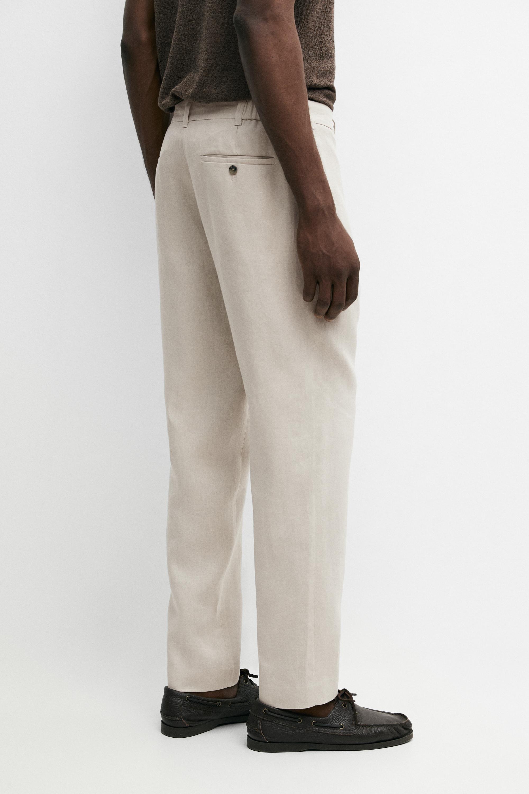 Tapered fit linen trousers