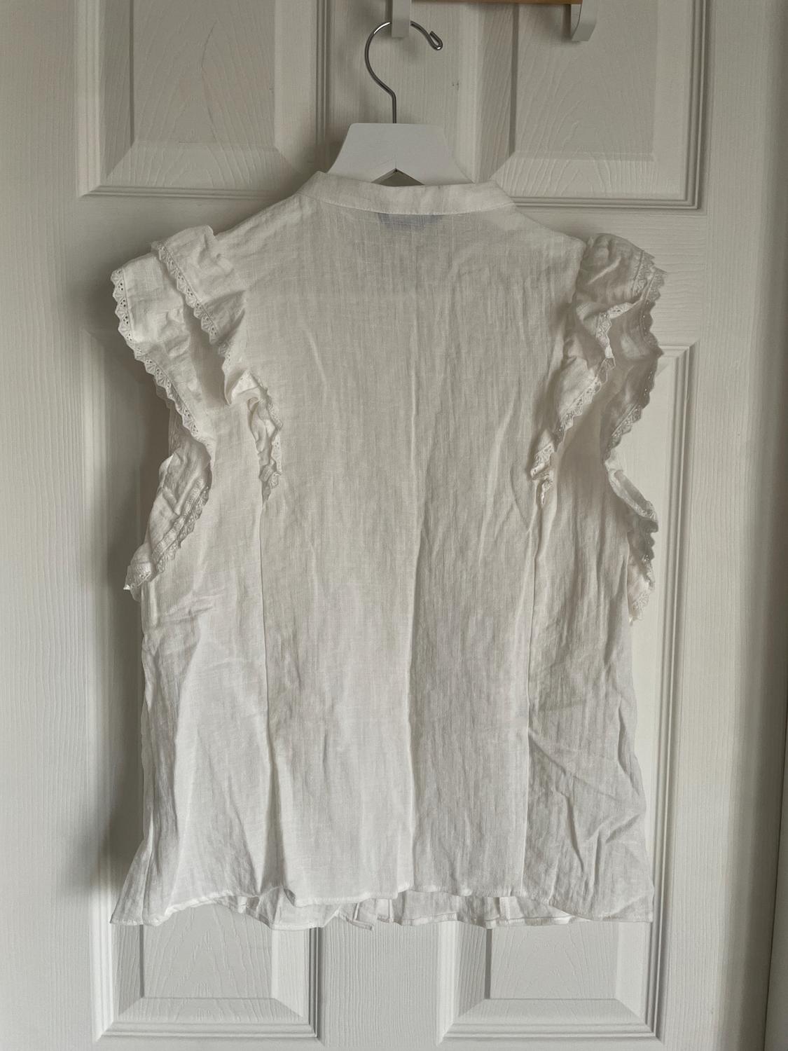 BLUSA VOLANTES ENTREDOSES - Image 2