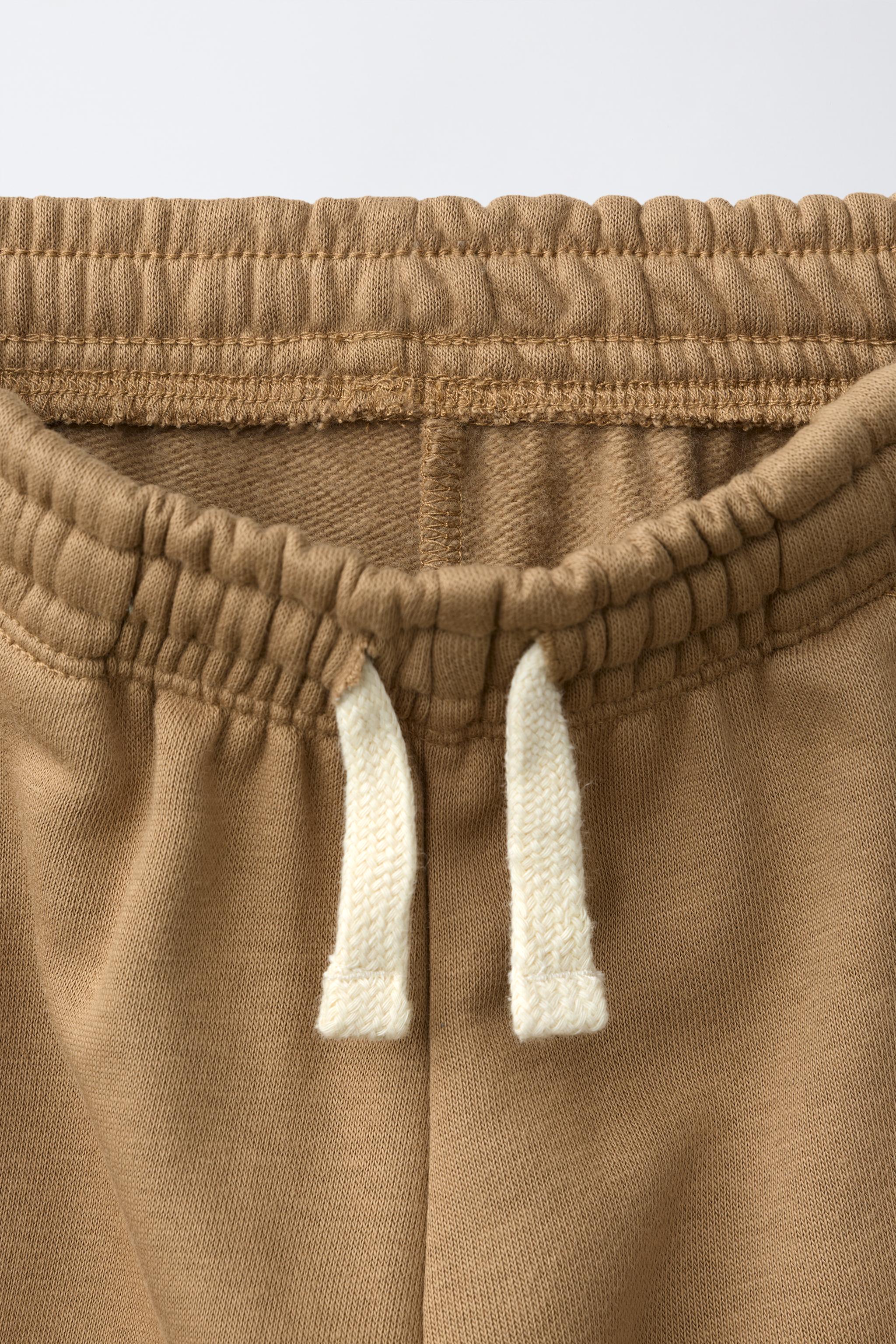 PANTALON EN MOLLETON CARGO VARSITY