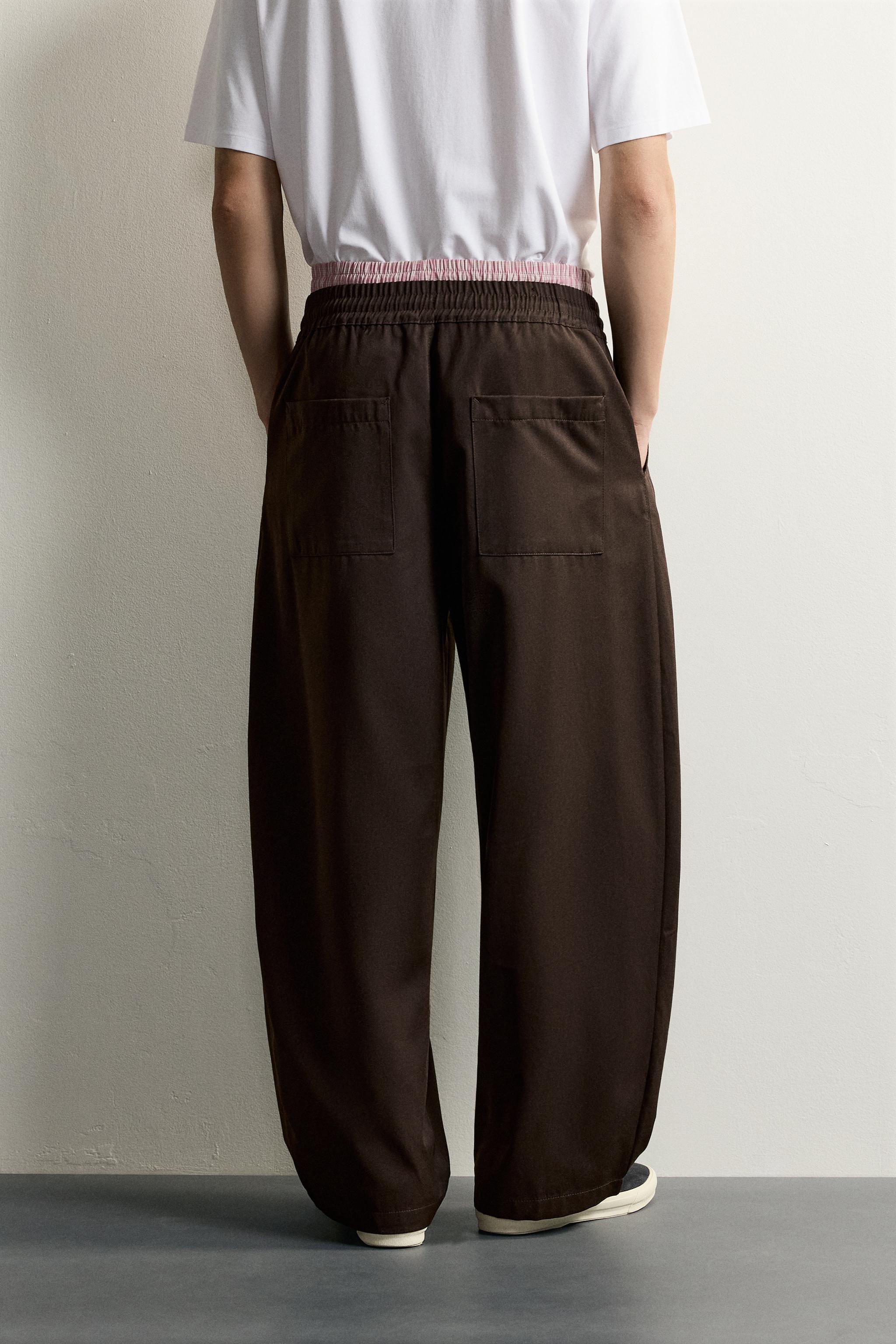 SIDE-PLEAT BALLOON FIT TROUSERS