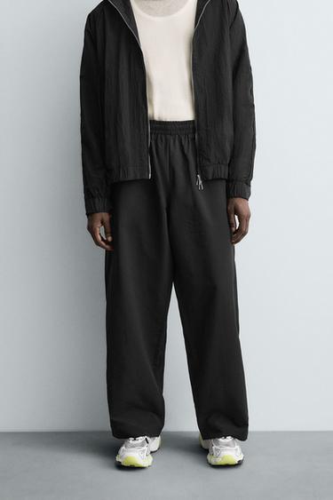 TECHNICAL TROUSERS WITH TAPING - Black by Zara