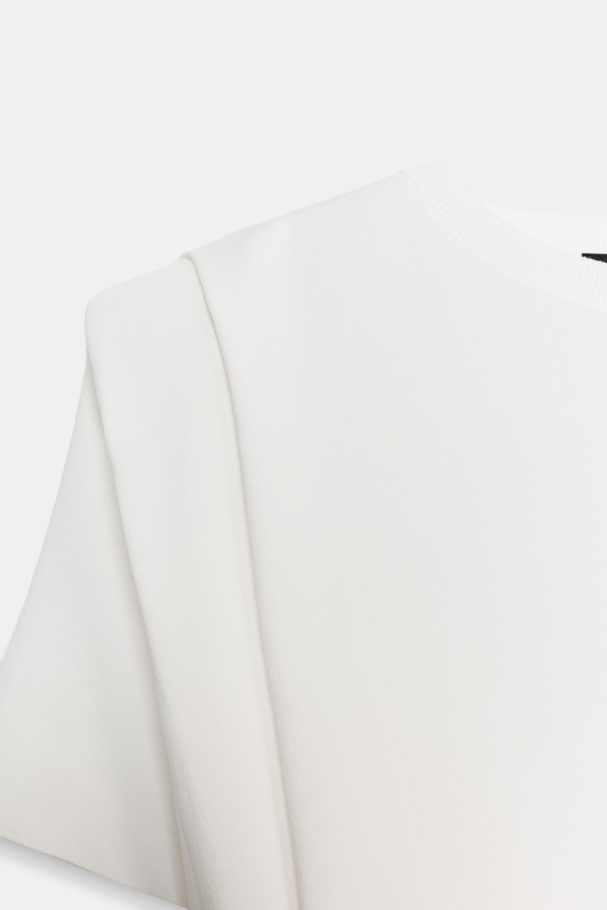 TOP EN MAILLE À ÉPAULETTES