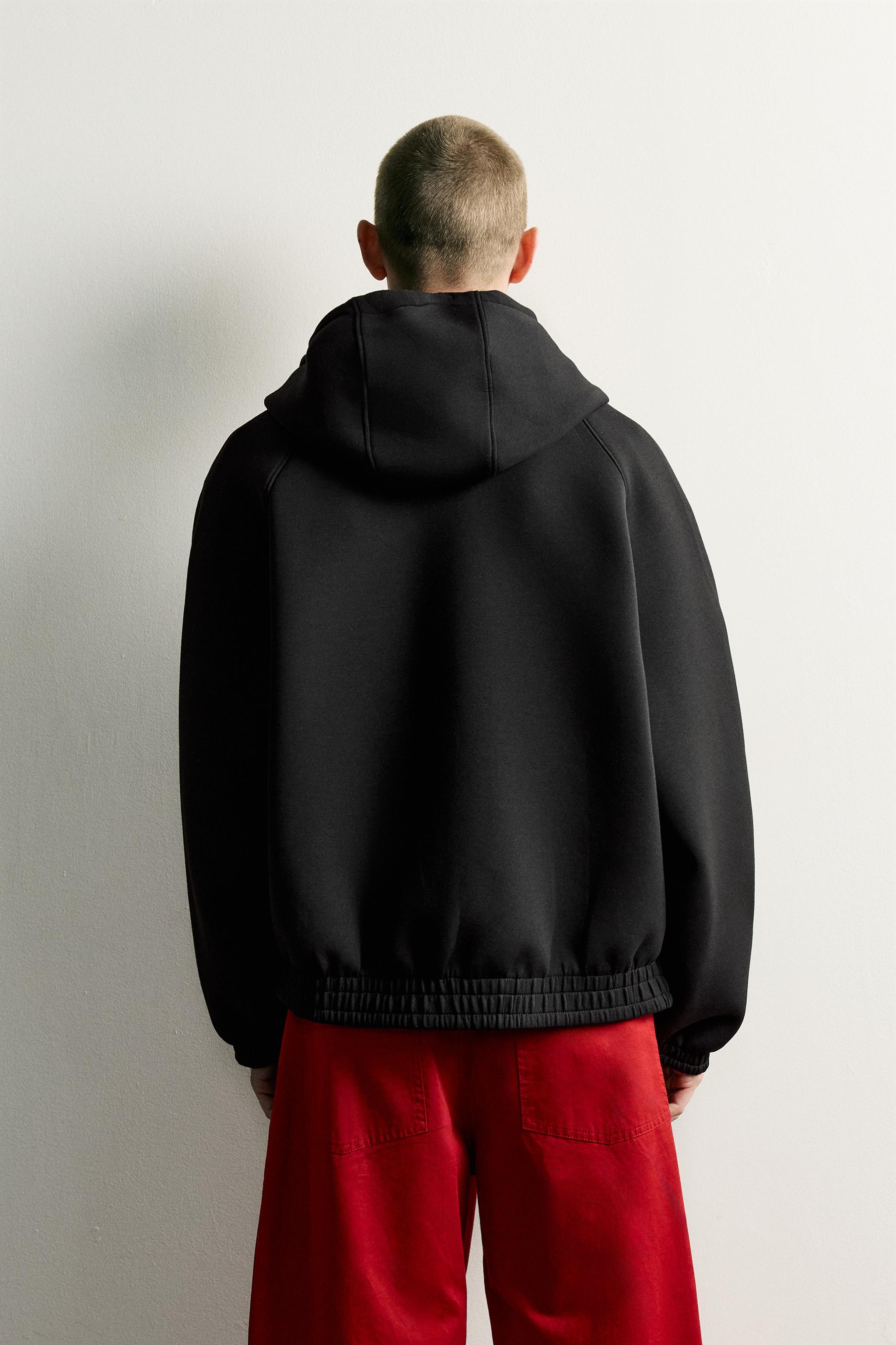 RELAXED-FIT TECHNICAL HOODED JACKET