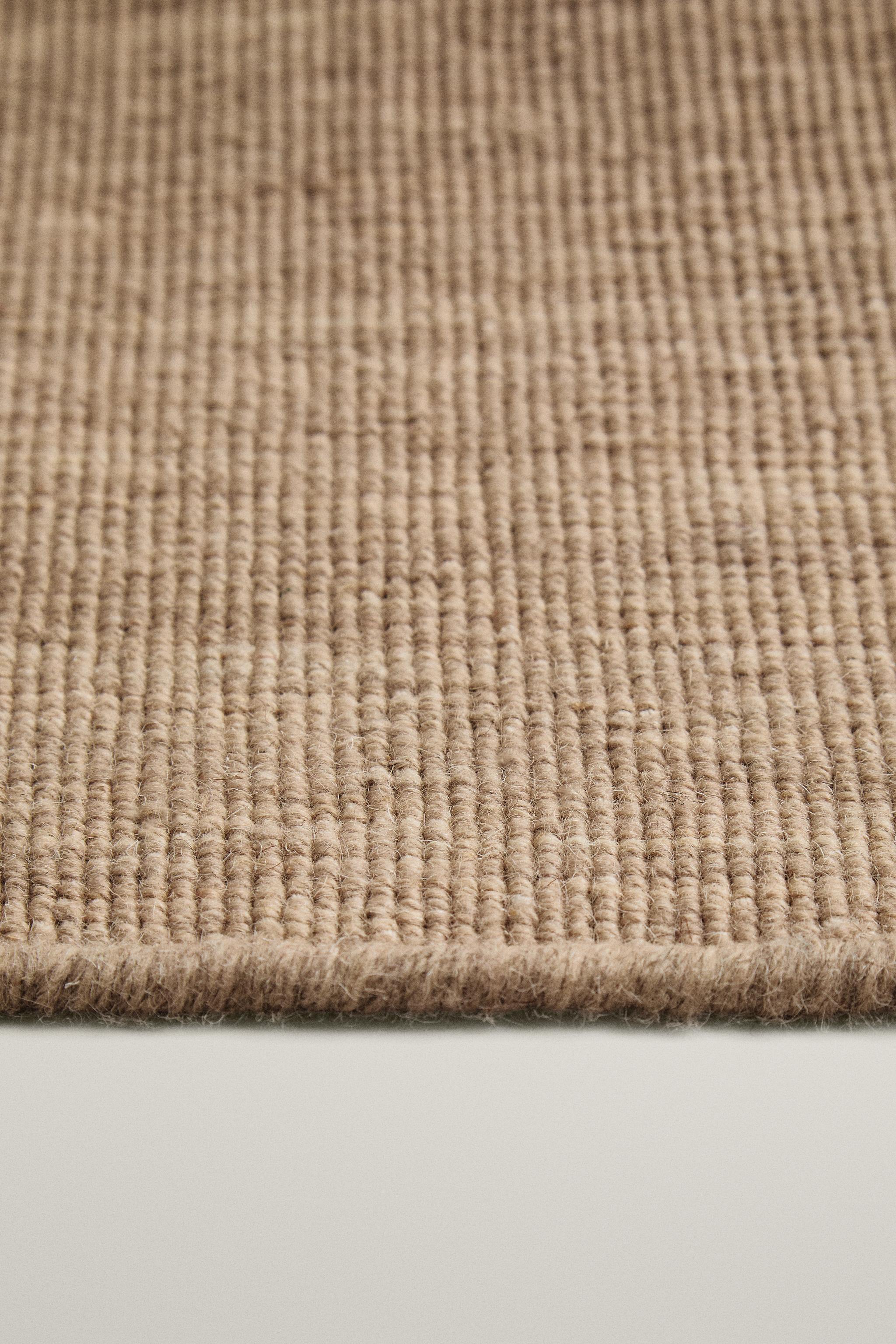COTTON AND WOOL KNOTTED AREA RUG