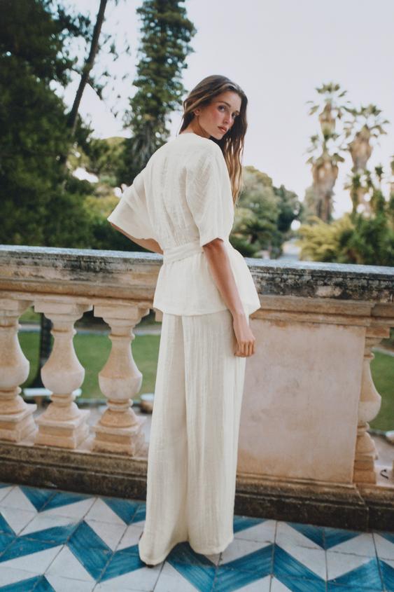 PANTALÓN ANCHO PLIEGUES - Crudo de Zara - Imagen 0
